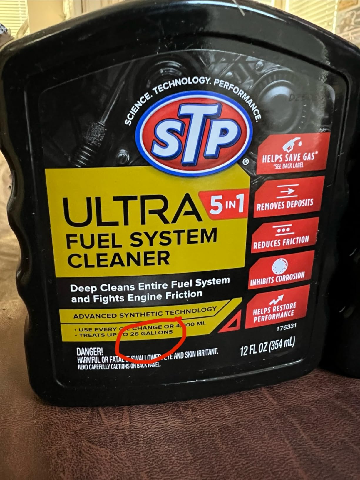 STP Ultra 5 In 1 Fuel System Cleaner and Stabilizer, Deep Cleans Fuel System and Fights Engine Friction, 12 FlOz customer photo 1
