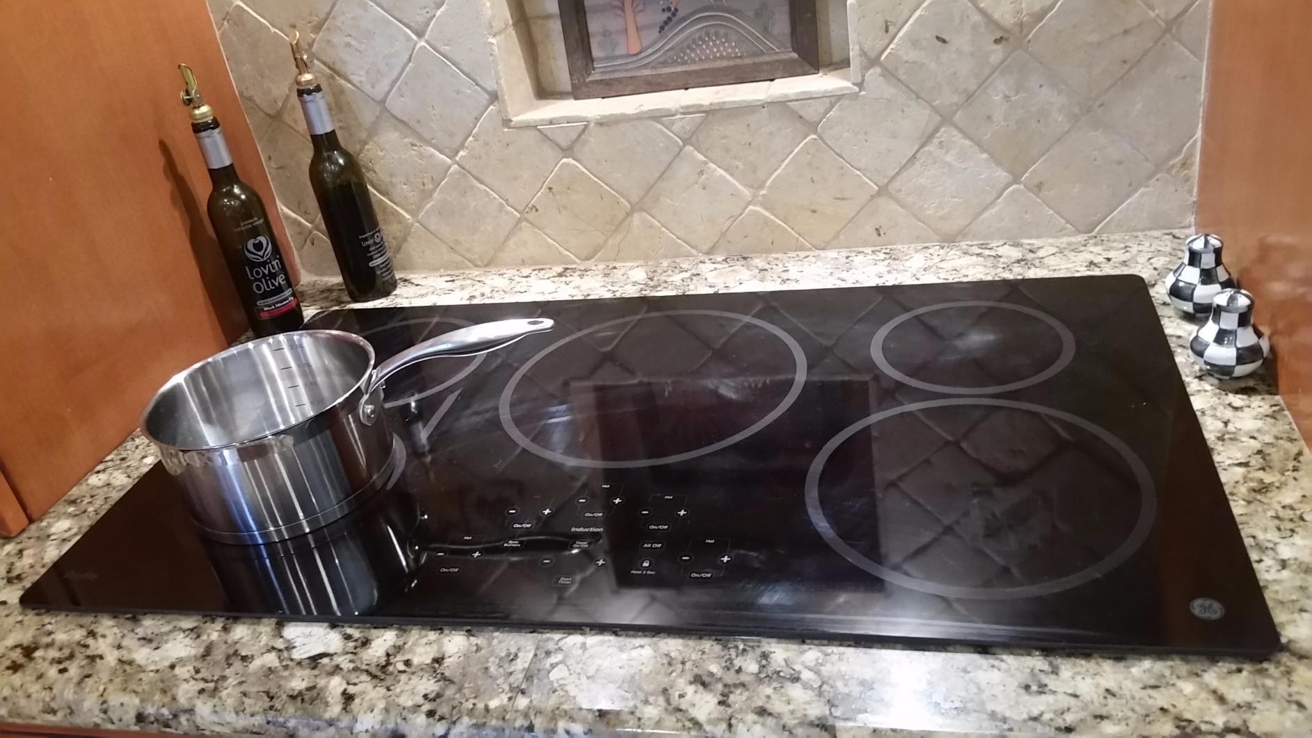 GE 36-Inch Cooktop with 5 Induction | Pan Size Sensors, SyncBurners, Red LED Display, Kitchen Timer, 3,700-Watt Element | ADA Compliant Fits Guarantee | PHP9036DJBB model customer photo 2