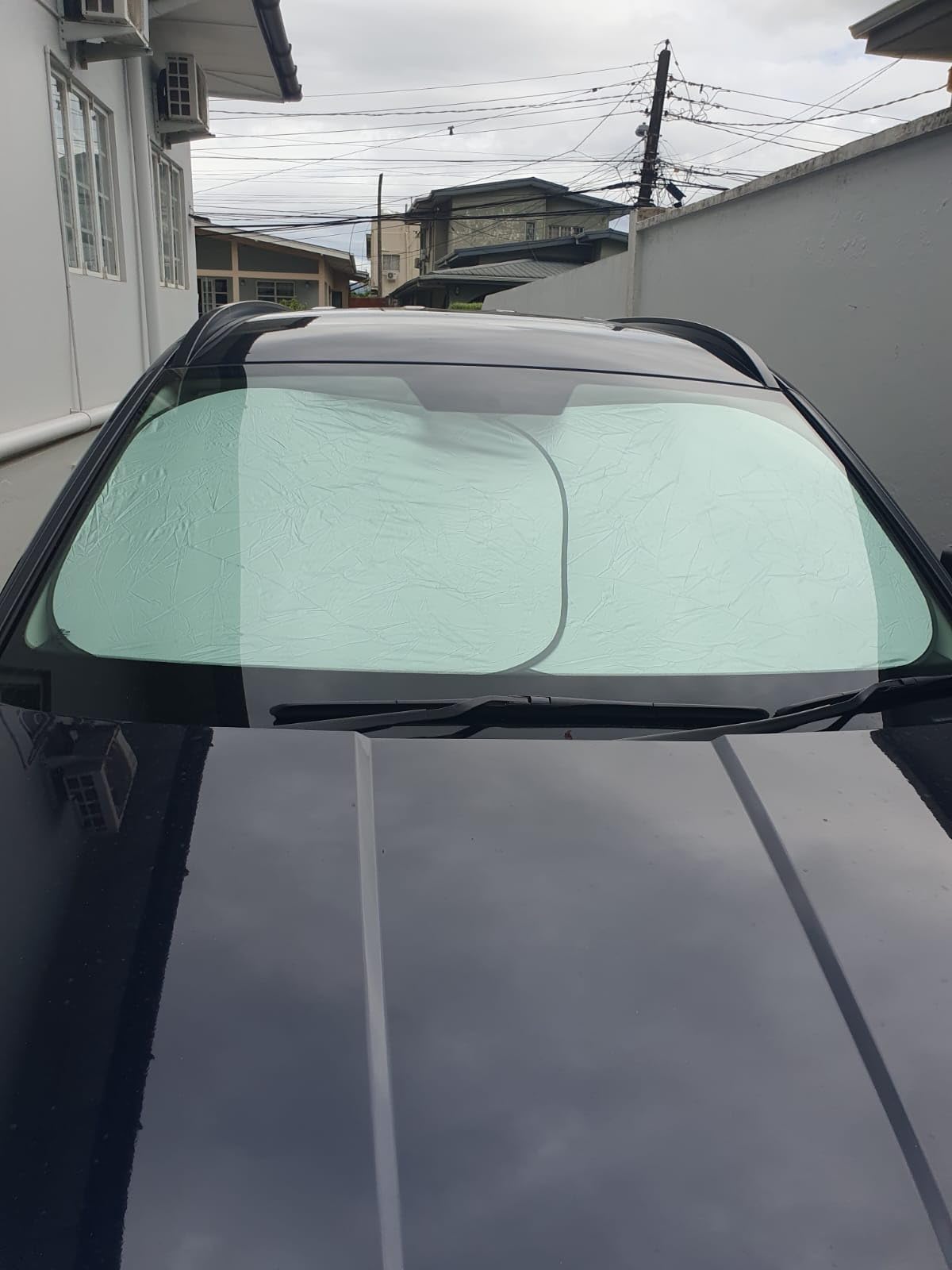 EzyShade Windshield Sun Shade with Shield-X Reflective Technology. See Size-Chart with Your Vehicle. Foldable 2-Piece Car Sunshades Reflect UV Sun and Heat and Protect Your Car. Standard (Medium) Size customer photo 2