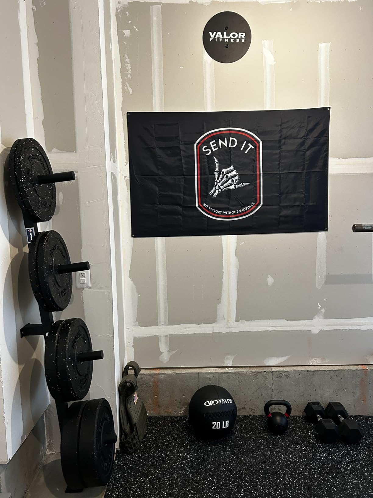 Titan Fitness Weight Plate Wall Mounted Storage Rack, Angled 4-Peg Design, Olympic Sized Weight Plate Organizer, Rated 800 LB, Anchored Wall Mounted Storage customer photo 1