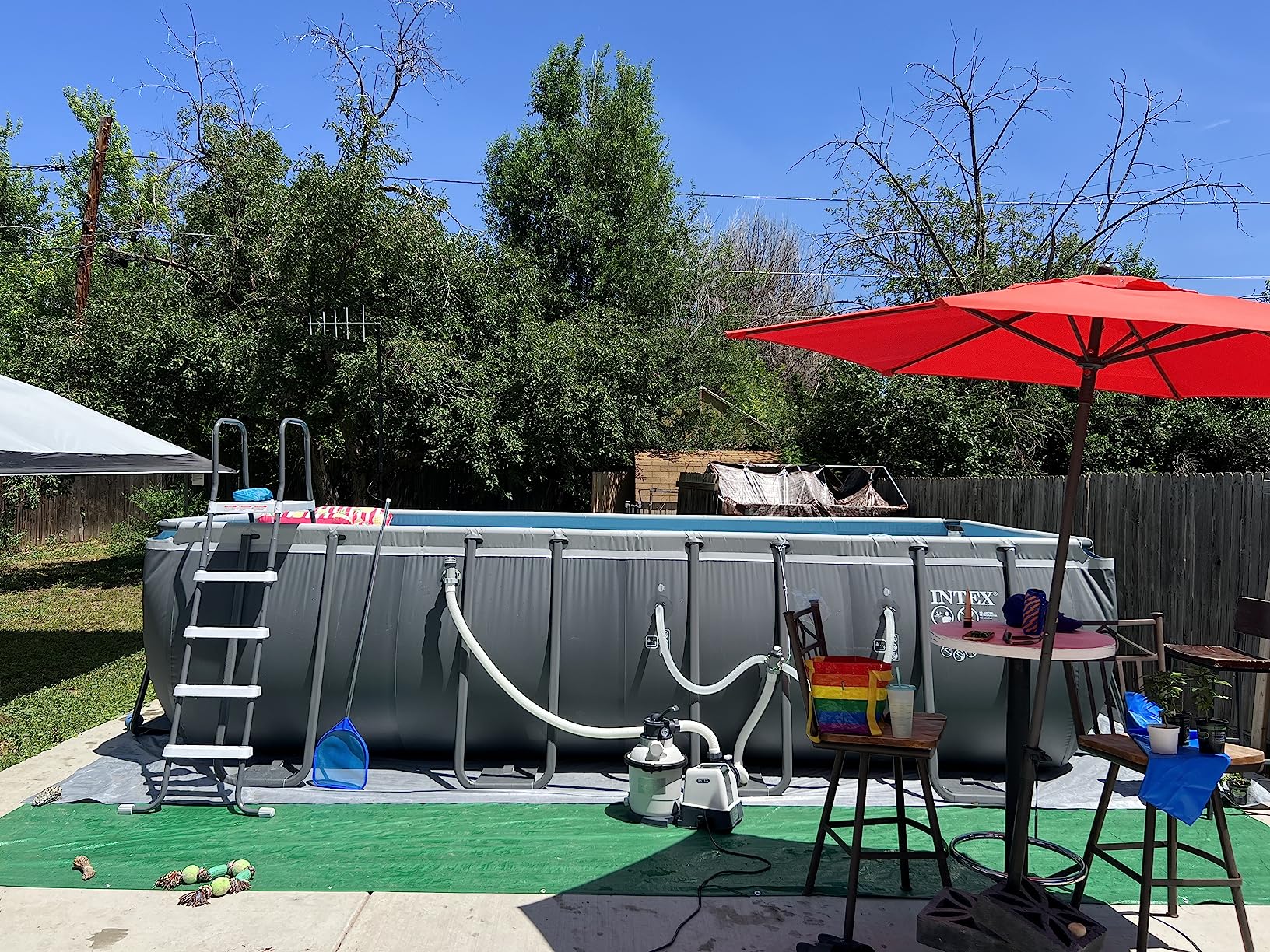 INTEX Ultra XTR 18 ft x 9 ft 52 in Above Ground Pool Set, Rectangular Swimming Pool with Steel Frame, 1500 GPH Sand Filter Pump, Ladder, Cover, & Ground Cloth customer photo 2