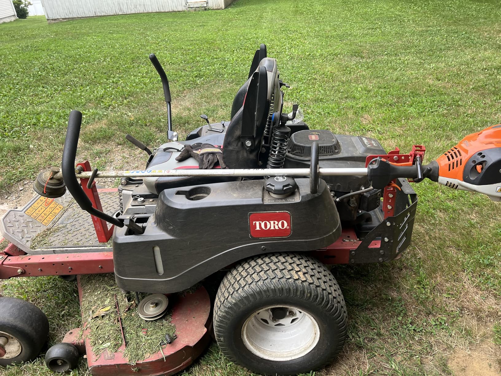 Jungle Jim's Mower Trimmer Rack - Universal Fit for Walk-Behind, Stand-On, and ZTR Mowers - Secures Trimmer for Transport - Lock-Ready for Theft Deterrence customer photo 1
