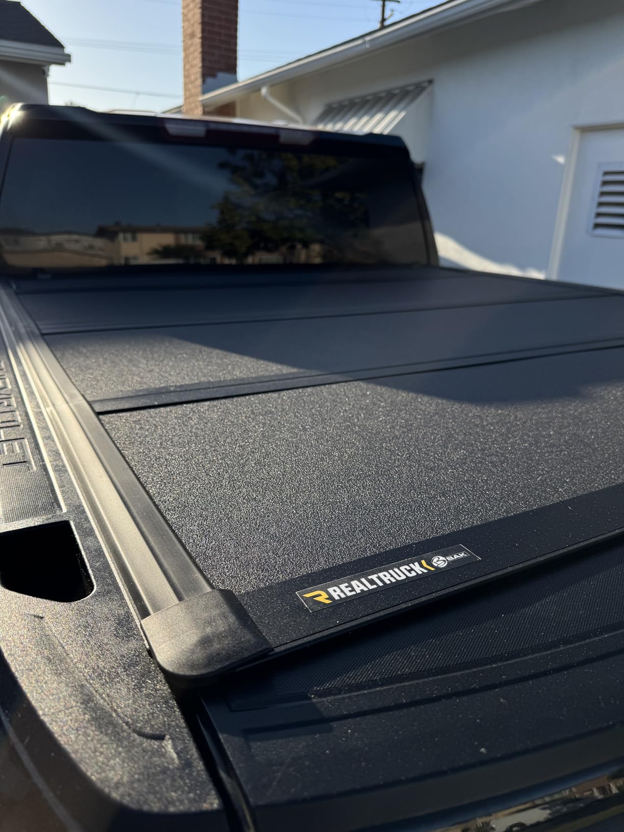 RealTruck BAK BAKFlip MX4 Hard Folding Truck Bed Tonneau Cover | 448130 | Fits 2019-2026 Chevy/GMC Silverado/Sierra, w/MultiPro/Flex Tailgate (Will not fit Carbon Pro Bed) 5' 10