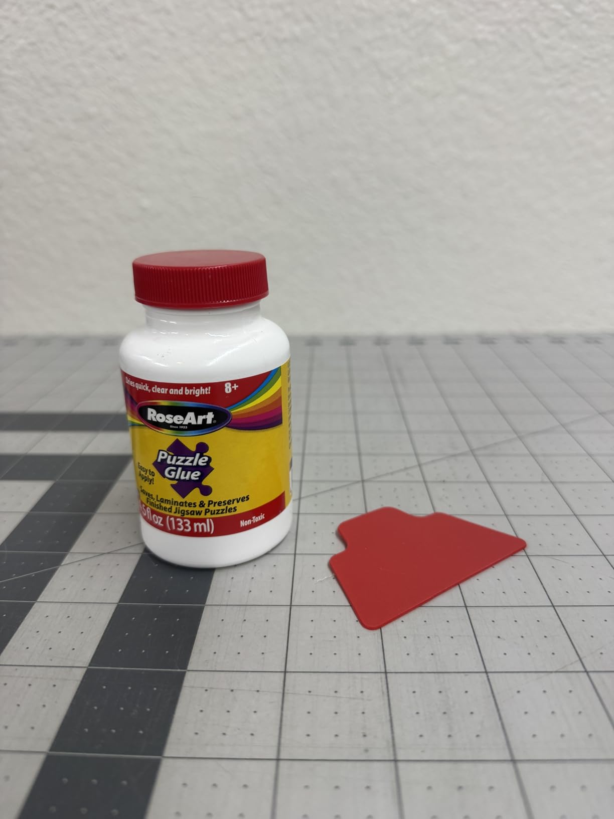 RoseArt Jigsaw Puzzle Glue with Applicator - Saves, Laminates and Preserves Finished Jigsaw Puzzles - Easy to Apply, Dries Quick, Clear & Bright customer photo 2