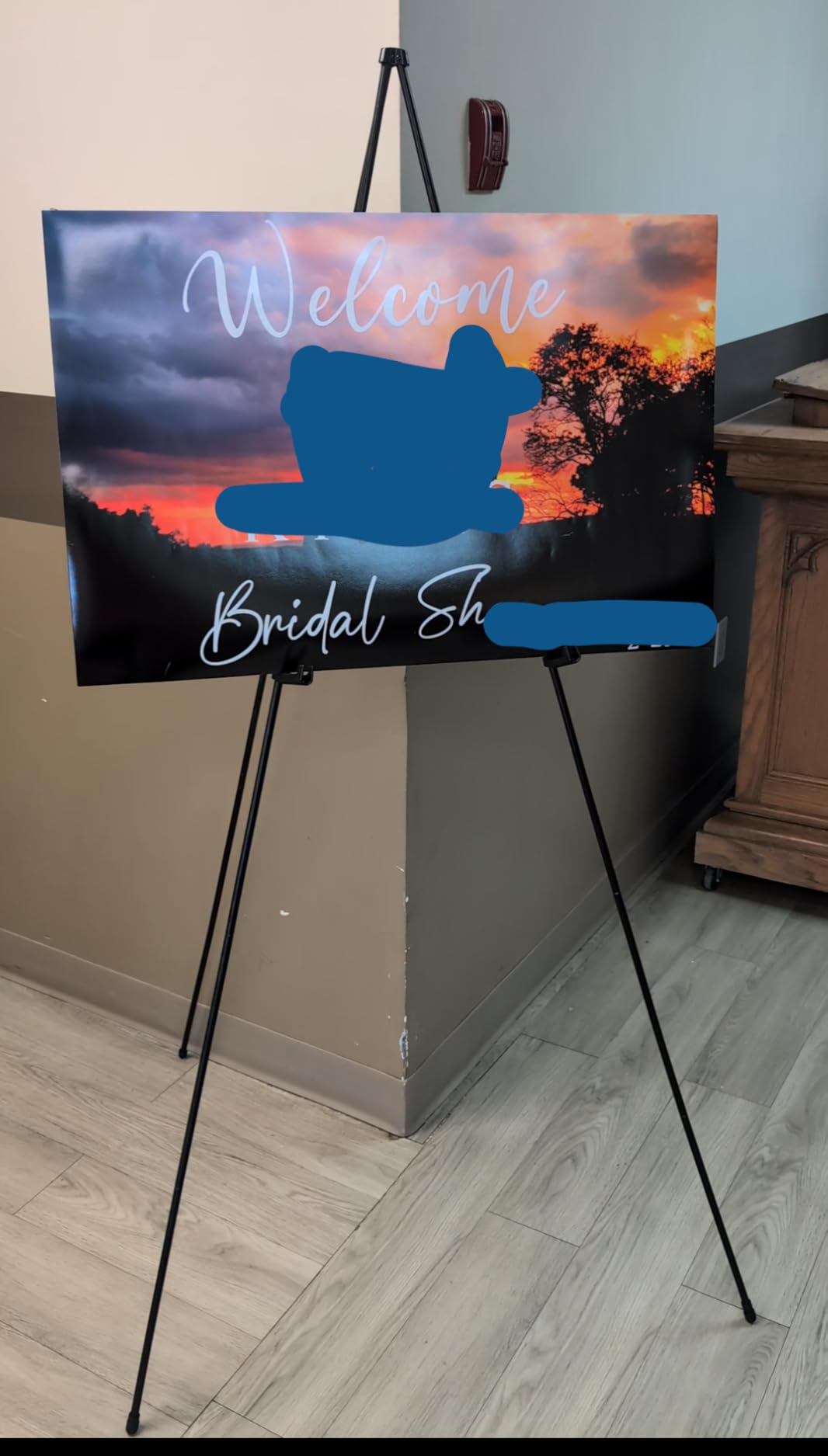 Amazon Basics Easel Display Stand, Instant Floor Poster, Lightweight, Collapsible and Portable with Tripod Base, Black Steel (supports 5 pounds) customer photo 1