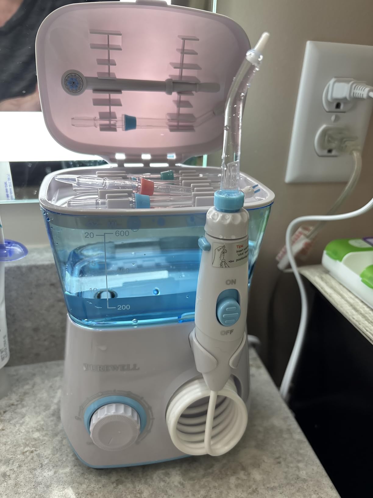 TUREWELL Water Flossing Oral Irrigator, 600ML Dental Cleaner 10 Adjustable Pressure, Electric Oral Flosser for Teeth/Braces, 8 Replacement Jet Tips for Family (White) customer photo 1