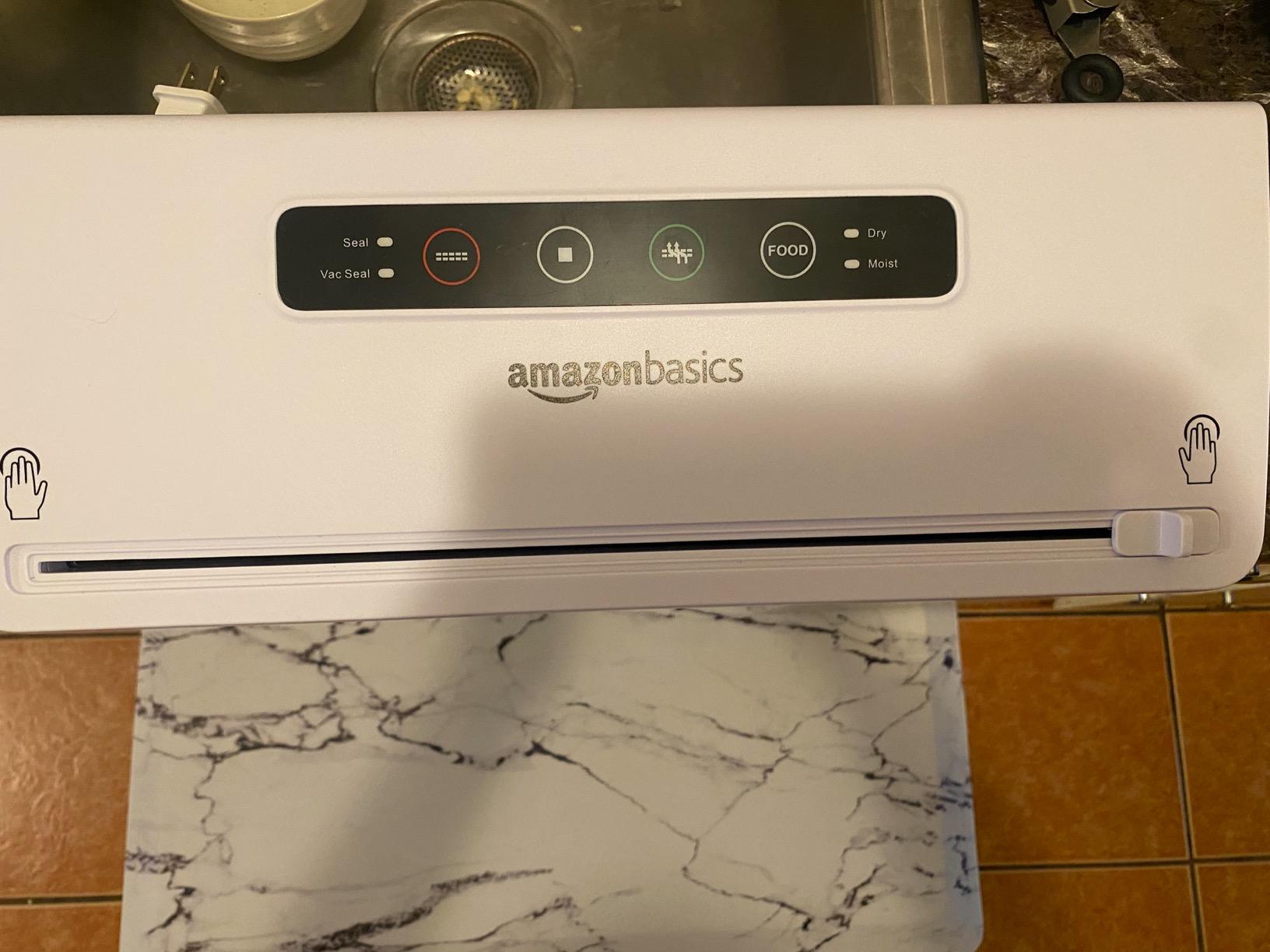 Amazon Basics Vacuum Sealer Machine for Food Preservation with Dry/Moist Mode, Built-in Cutter and Air Suction Hose, Black customer photo 1