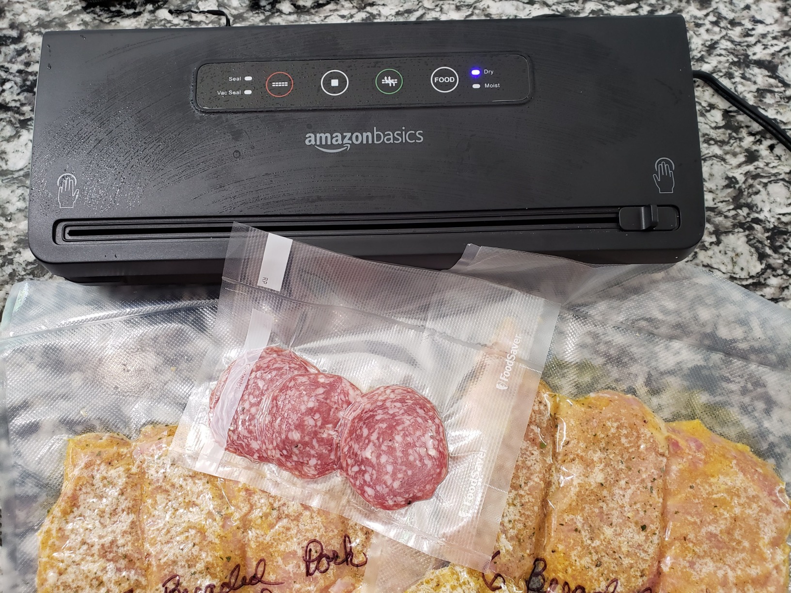 Amazon Basics Vacuum Sealer Machine for Food Preservation with Dry/Moist Mode, Built-in Cutter and Air Suction Hose, Black customer photo 2