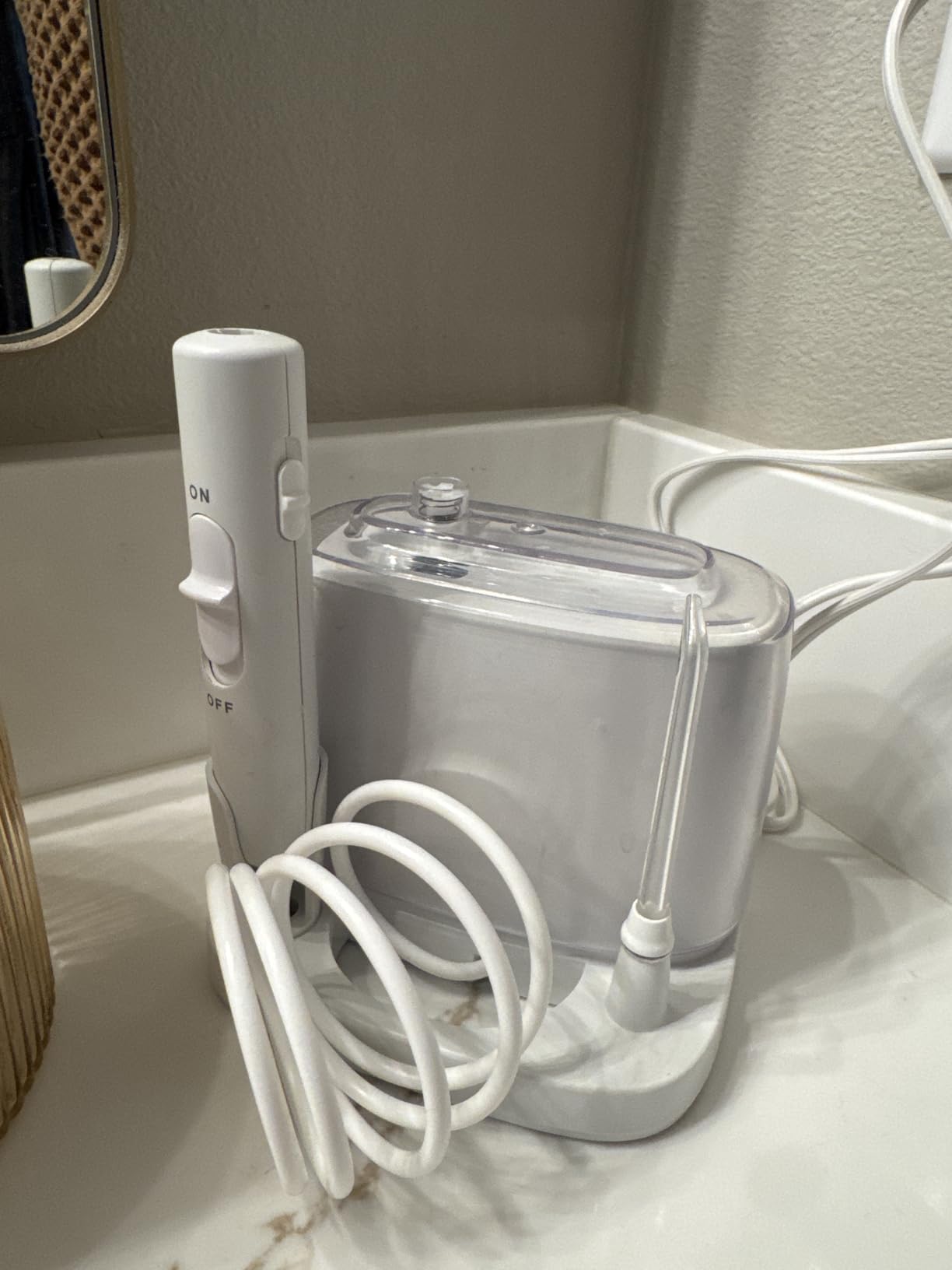 Waterpik Nano Plus Water Flosser For Teeth, Portable Electric Power, Compact For Travel and Home, 4 Flossing Tips, ADA Accepted, White WP-320 customer photo 1