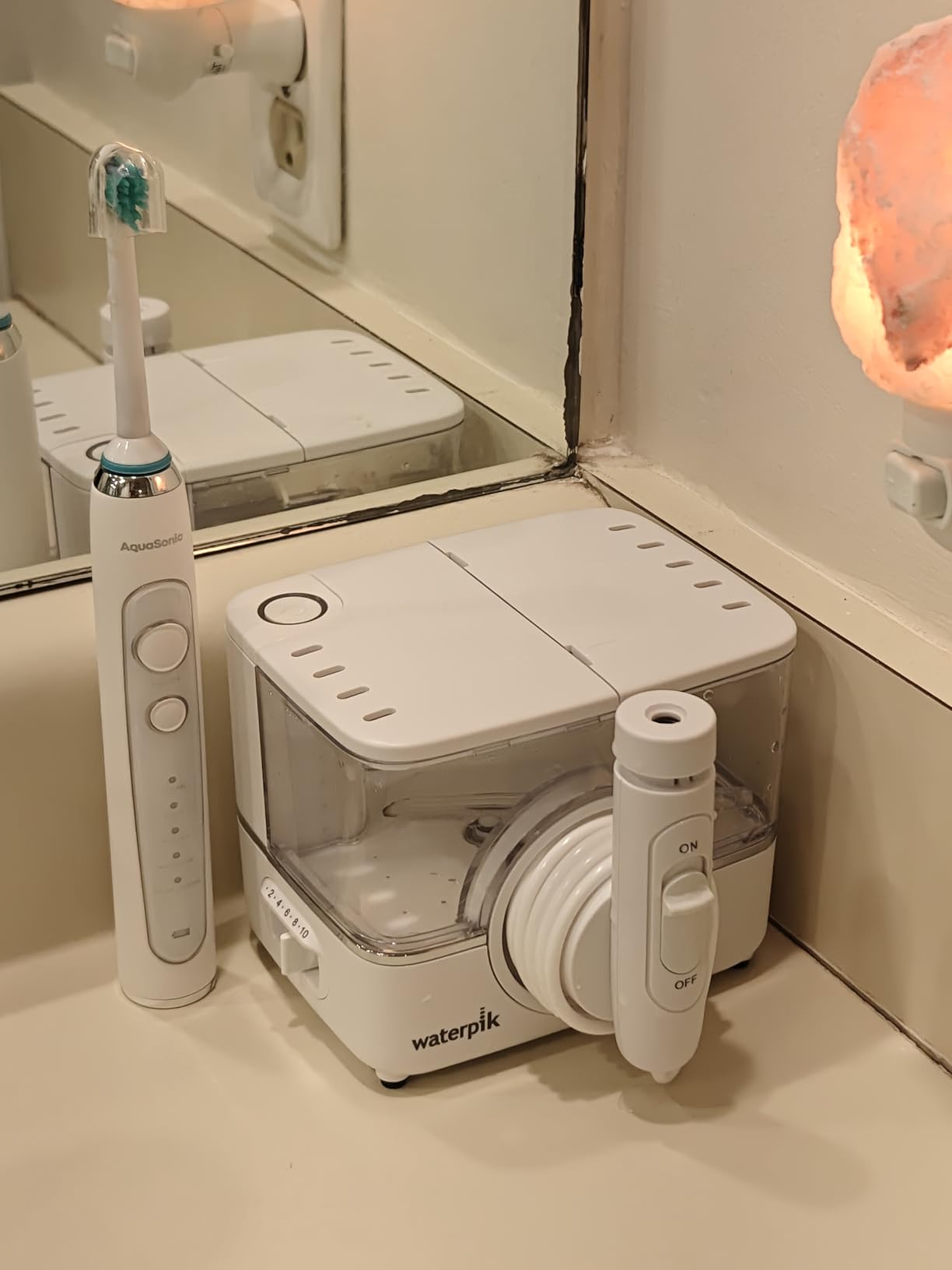 Waterpik ION Professional Water Flosser, Rechargeable and Portable for Teeth, Gums, Braces, 10 Settings, 7 Flossing Tips For Multiple Users And Needs, ADA Accepted, WF-12 White, Packaging May Vary customer photo 1