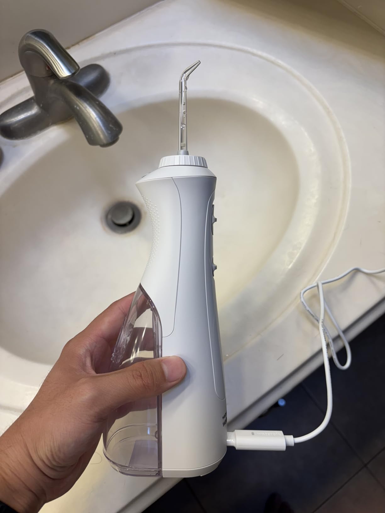 Waterpik Cordless Pearl Rechargeable Portable Water Flosser for Teeth, Gums, Braces Care and Travel, Extra Quiet, 4 Flossing Tips - ADA Accepted, WF-13 White, Amazon Exclusive customer photo 2