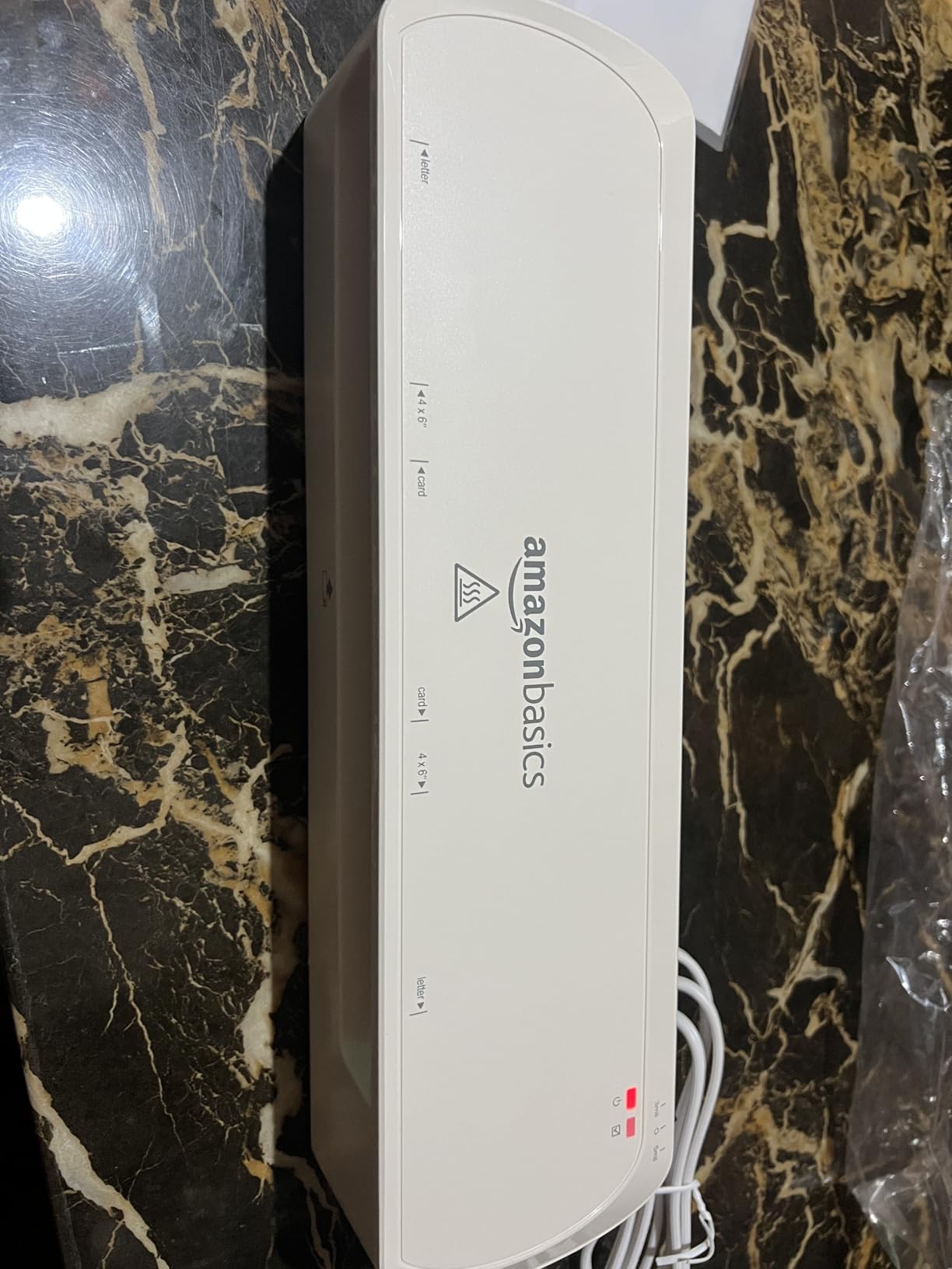 Amazon Basics 9-Inch Thermal Laminator Machine with Quick Warm-Up, 2 Heat Settings, Jam Release for Documents and Photos, White customer photo 1