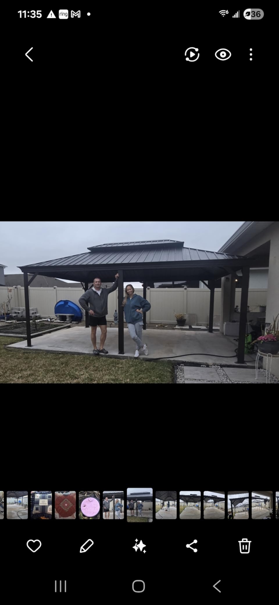 Kozyard Alexander Hardtop Aluminum Permanent Gazebo with a Mosquito Net and Privacy Sidewalls (Alexander 12'x14' Brown) customer photo 1