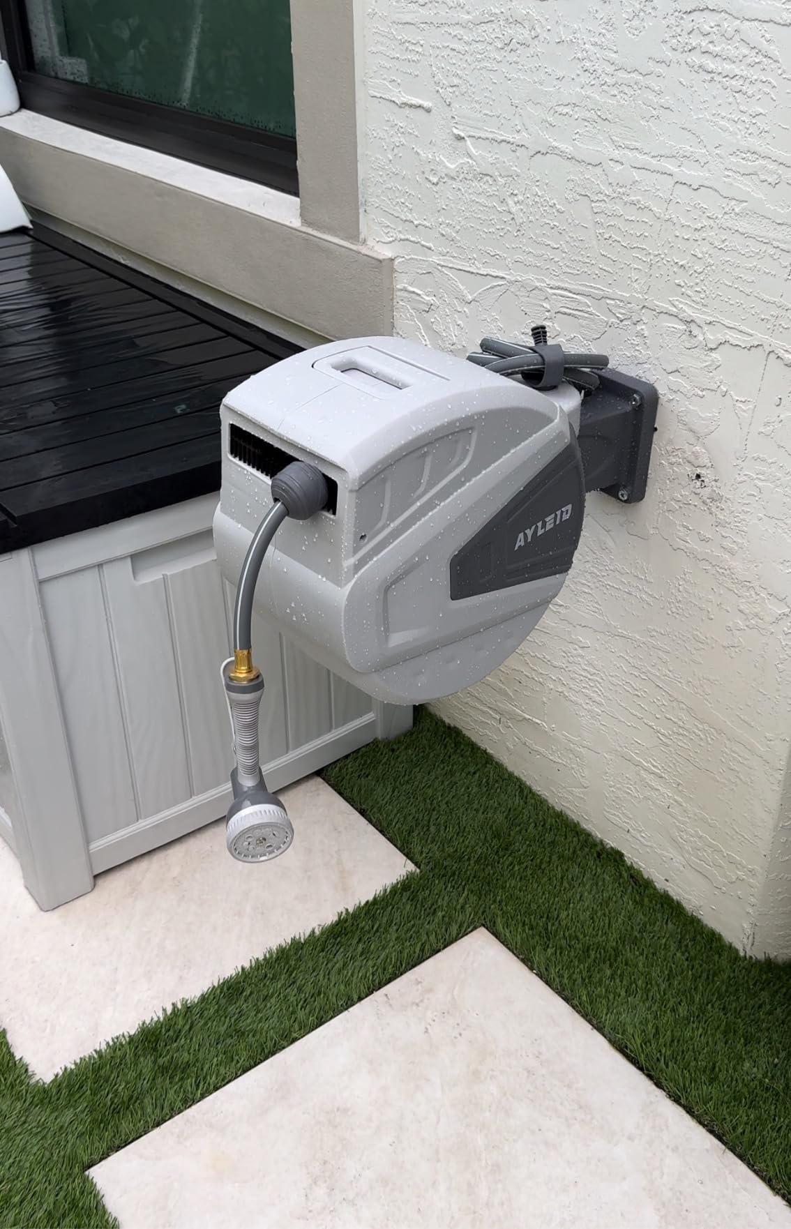 Ayleid Retractable Garden Hose Reel,1/2 in x 100 ft Wall Mounted Hose Reel, with 9- Function Sprayer Nozzle, Any Length Lock/Slow Return System/Wall Mounted/180°Swivel Bracket (Gray) customer photo 2