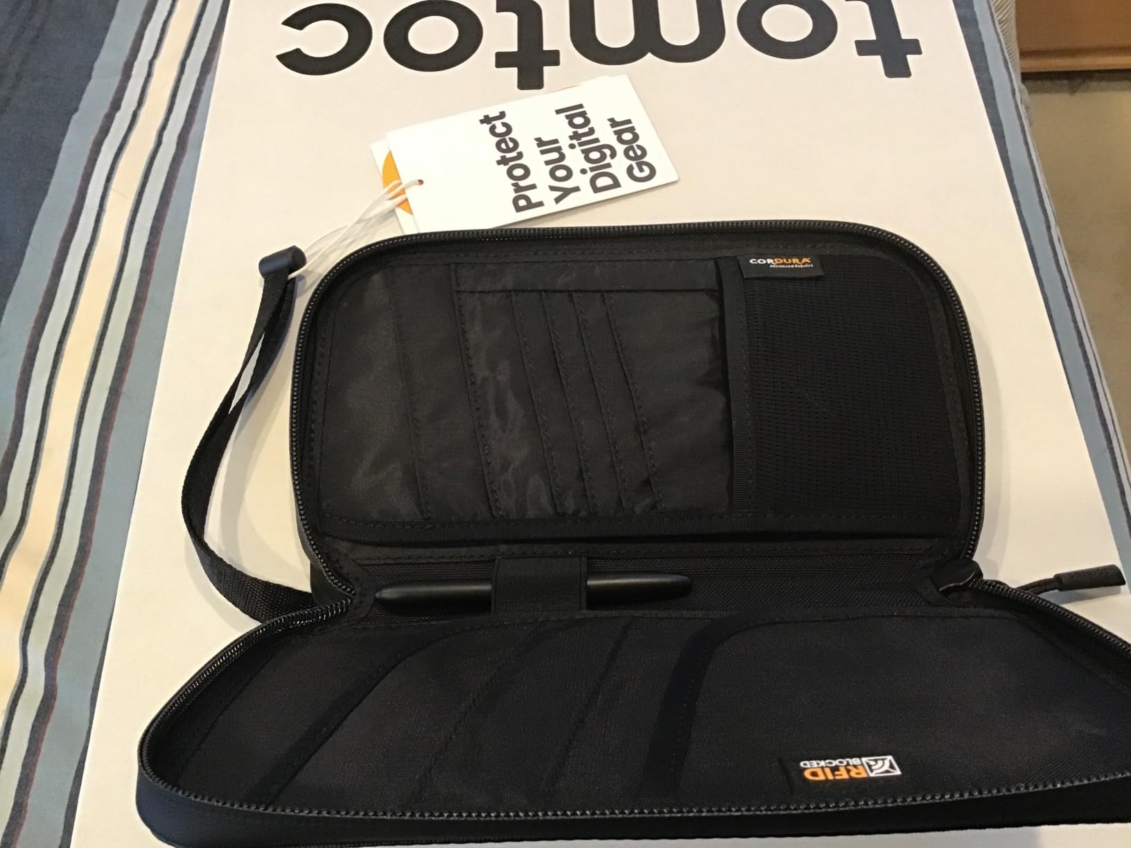 tomtoc Passport Holder Family with RFID Blocking, Passport Wallet Women Men, with Airtag & Sim Card Holder and Eject Pin customer photo 1