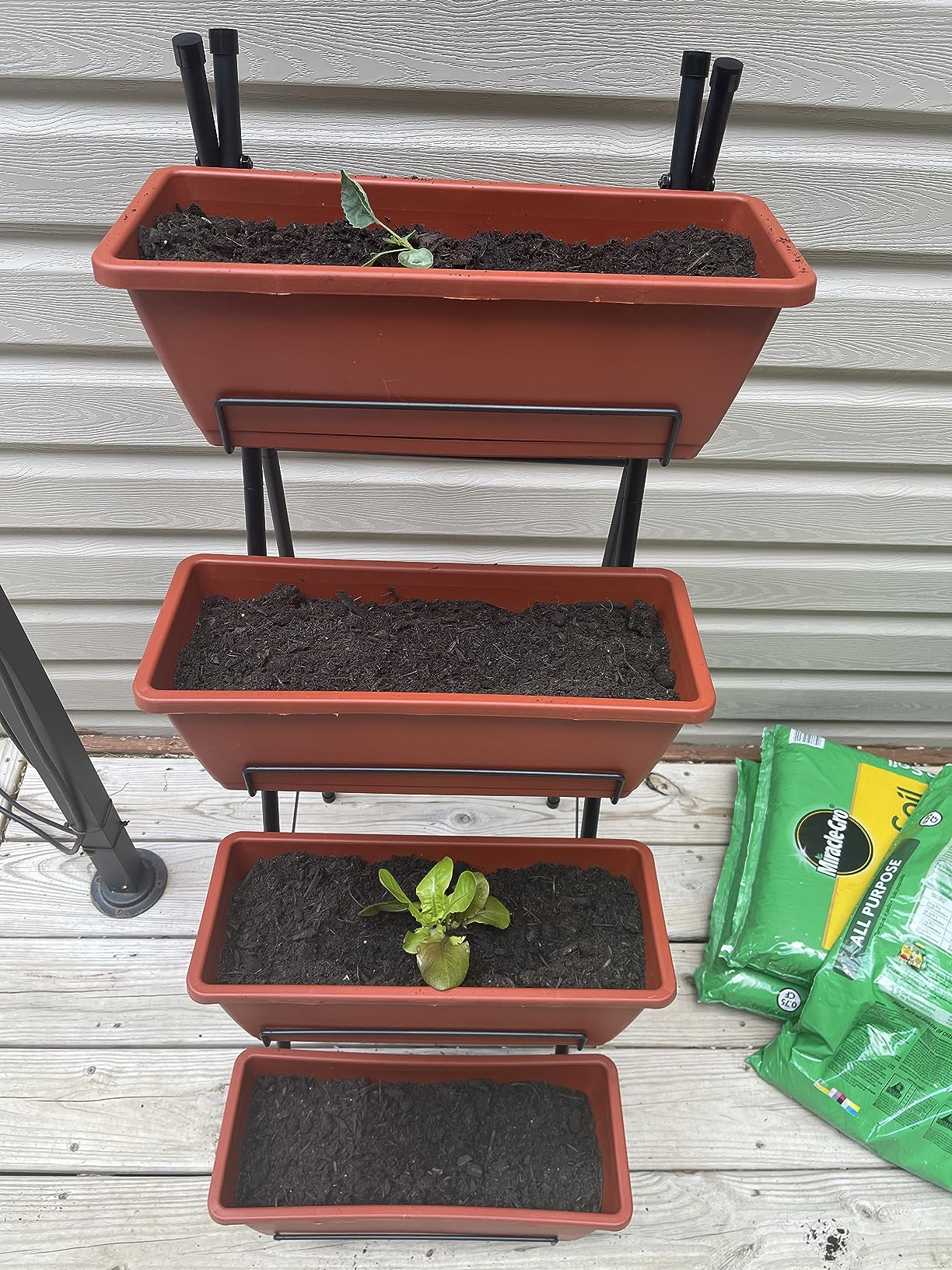 OYEAL Raised Garden Bed 4 Tier Vertical Garden Planters Indoor Outdoor Raised Planter Box with Legs Elevated Herb Garden Planter for Flowers Vegetables Plants, Black customer photo 2