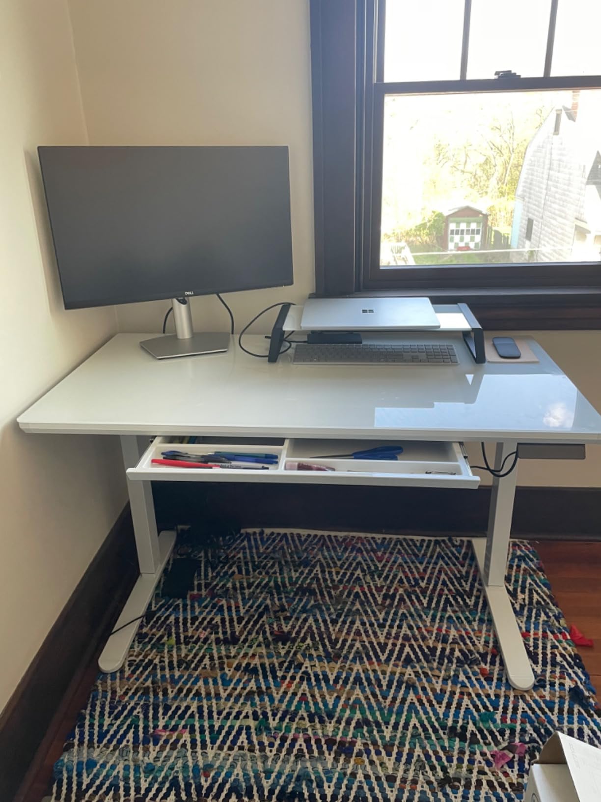 SHW 48x24 Glass Electric Height Adjustable Standing Desk - Motorized Sit Stand Desk with Monitor Riser, Pull-Out Drawer, Memory Presets, White customer photo 1