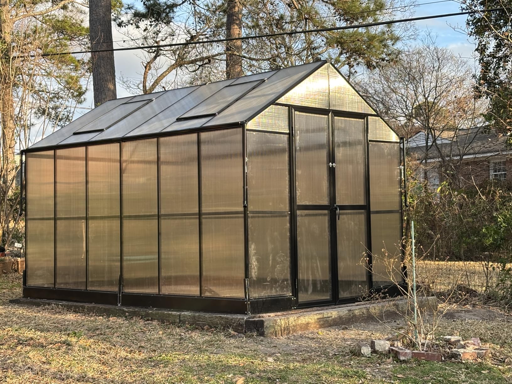 HOWE 8x10x7.5 FT Polycarbonate Greenhouse Double Swing Doors 2 Vents 5.2FT Added Wall Height, Walk-in Large Aluminum Sunroom Winter Greenhouse for Outdoors, Black customer photo 1