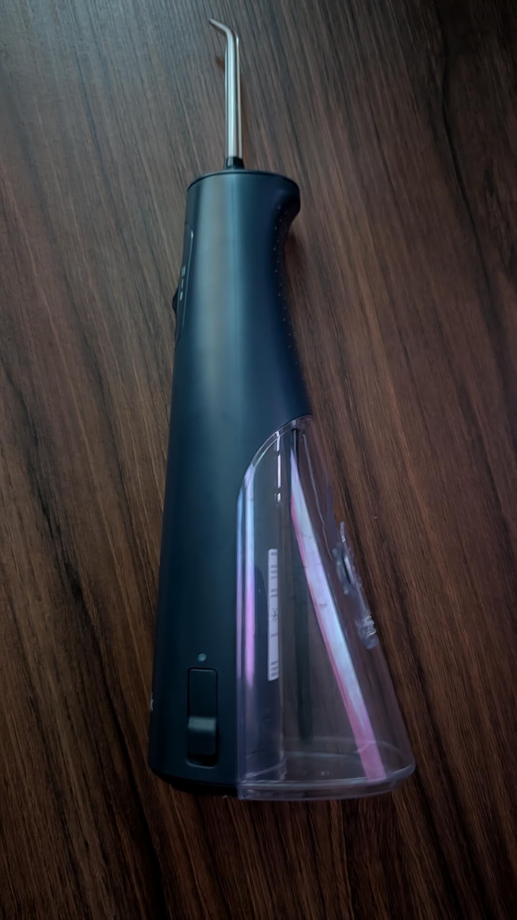 Waterpik Cordless Pulse Rechargeable Portable Water Flosser for Teeth, Gums, Braces Care and Travel with 2 Flossing Tips, Waterproof for Shower, ADA Accepted, WF-20 White customer photo 1