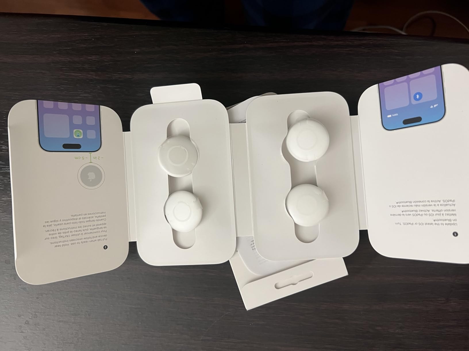 AirTag (1st Generation) - 4 Pack. Keep Track of and find Your Keys, Wallet, Luggage, Backpack, and More. Simple one-tap Set up with iPhone or iPad, Bluetooth customer photo 2