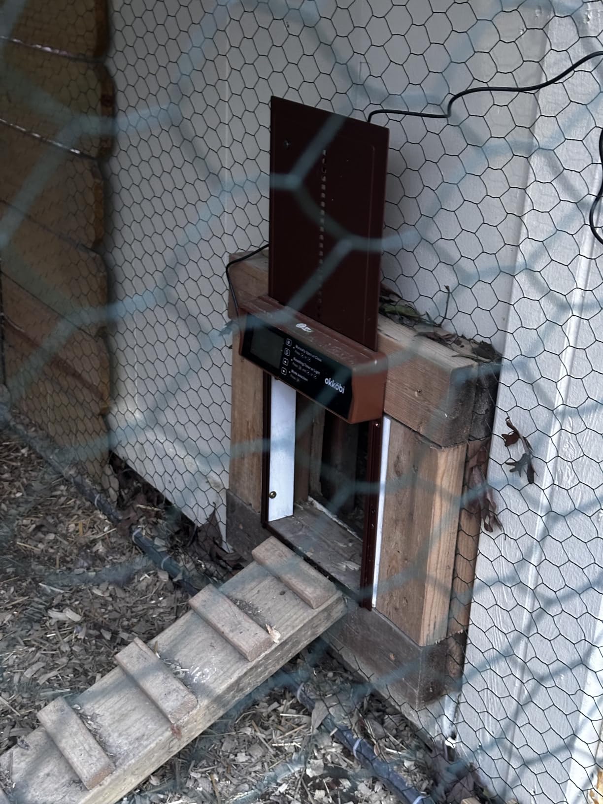 Okkobi Automatic Chicken Coop Door Solar Powered - LCD Display - Chicken Coop Door with Remote Control, Light Sensor & Timer - Security & Peace of Mind: Anti-Pinch function - 5-Year Protection - Brown customer photo 1