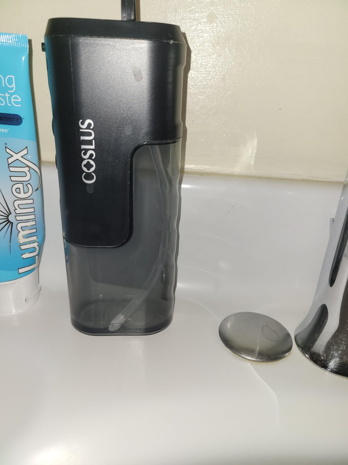 COSLUS T40 Mini Water Flosser for Travel: Portable Compact Design, Cordless Oral Irrigator with 4 Jet Tips, Removable Tank & IPX7 Waterproof for Braces, Sensitive Teeth & On-The-Go Use, Pink Purple customer photo 1