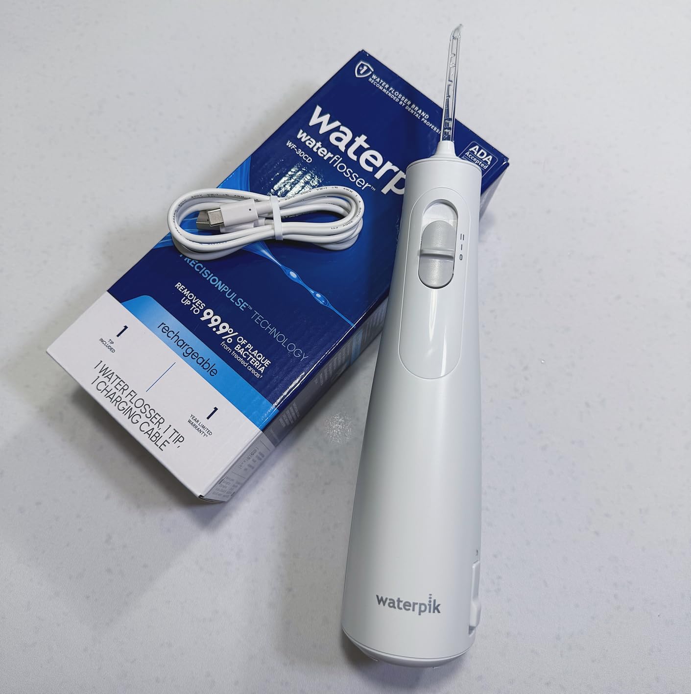 Waterpik Cordless 1100 Rechargeable Portable Water Flosser for Teeth Cleaning and Flossing, Travel, Braces Care, Healthier Gums, Waterproof for Shower, ADA Accepted, WF-30CD White customer photo 1