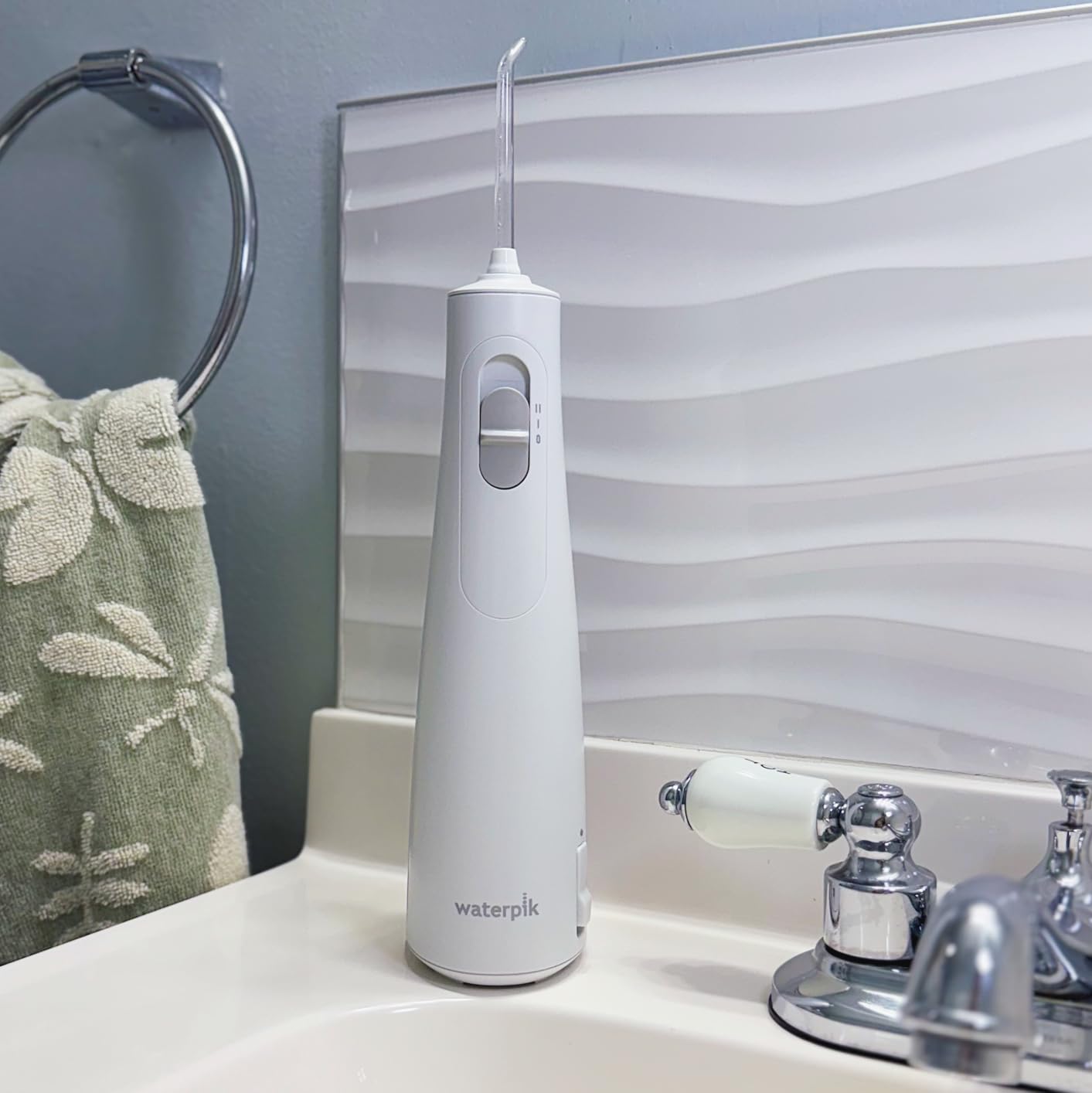 Waterpik Cordless 1100 Rechargeable Portable Water Flosser for Teeth Cleaning and Flossing, Travel, Braces Care, Healthier Gums, Waterproof for Shower, ADA Accepted, WF-30CD White customer photo 2