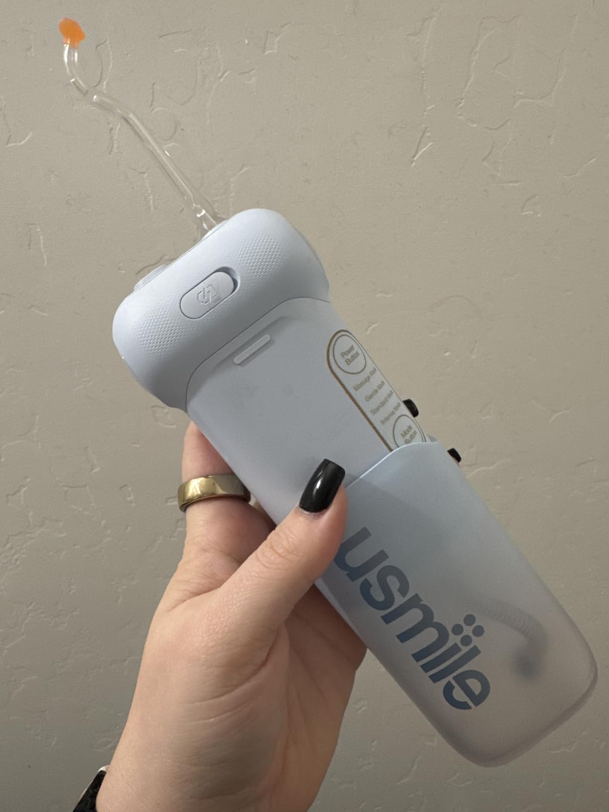 usmile C10 Portable Water Flosser - Travel-Friendly, 95-Day Battery, 4 Modes, 360° Nozzle, 180ml Tank, IPX7 Waterproof, Dentist-Recommended for Braces, Implants & Sensitive Gums (White) customer photo 1