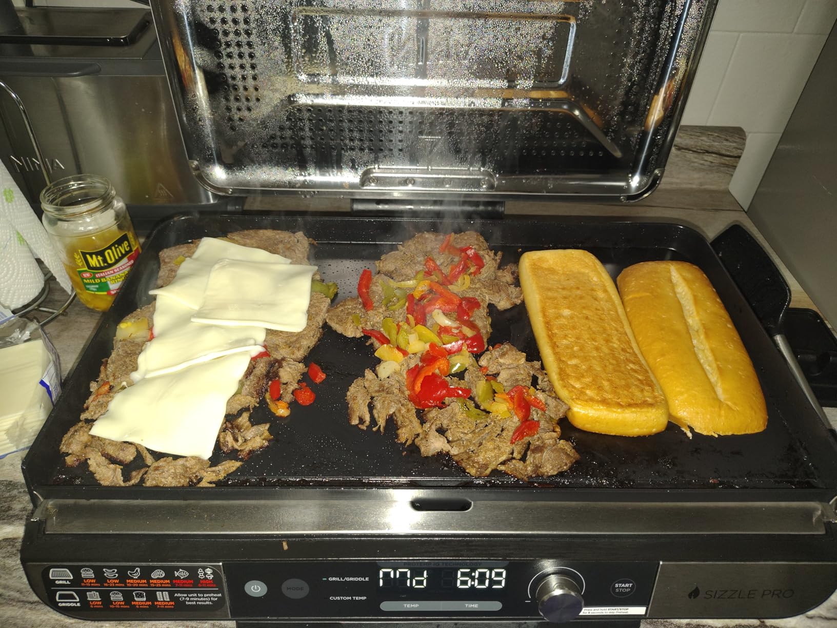 Ninja Sizzle Pro XL 20-Inch Indoor Griddle + Grill, Detachable Ventilated Lid, Grease Control, Ceramic Nonstick Plates, Even Edge Cooking, Extra Large Capacity, Versatile, Silver, GX101 customer photo 2