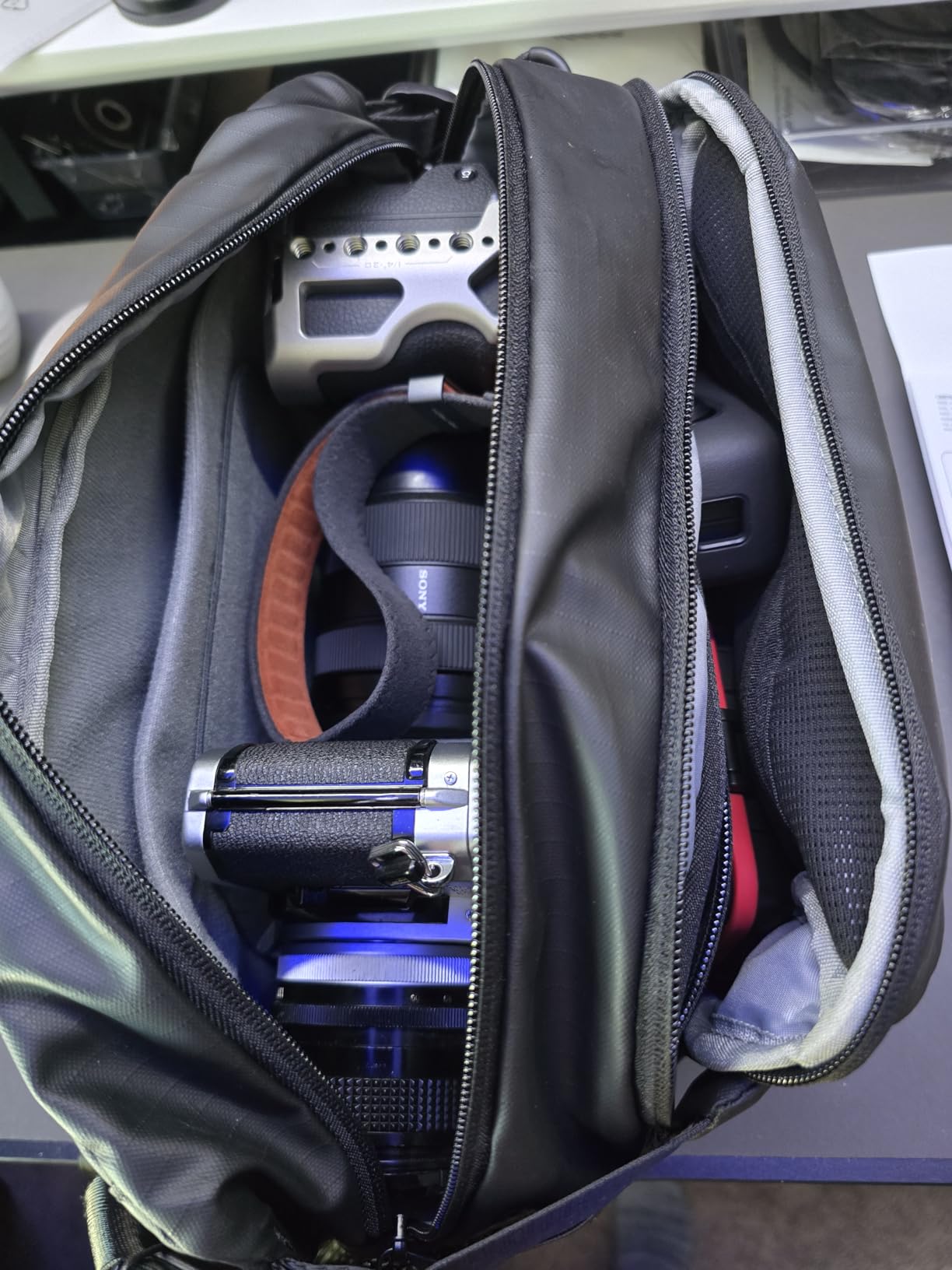 TARION Outdoor Camera Sling Bag - Compact 5.5L Messenger Case for Mirrorless - Expandable Wet/Dry Drawstring Pocket - Waterproof Crossbody with Tripod Holder - XProber customer photo 2