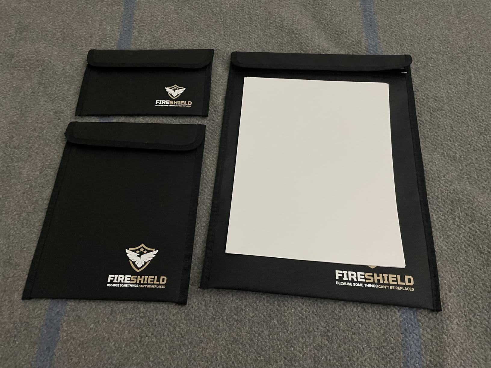 FIRESHIELD PRO Upgraded 2000°F Fireproof Document Bag 3-Pack - Fire & Water Resistant Money Pouch for Cash - Safe Storage for Family Photos, Jewelry, Passport & Important Documents - Size: S, M & L customer photo 1