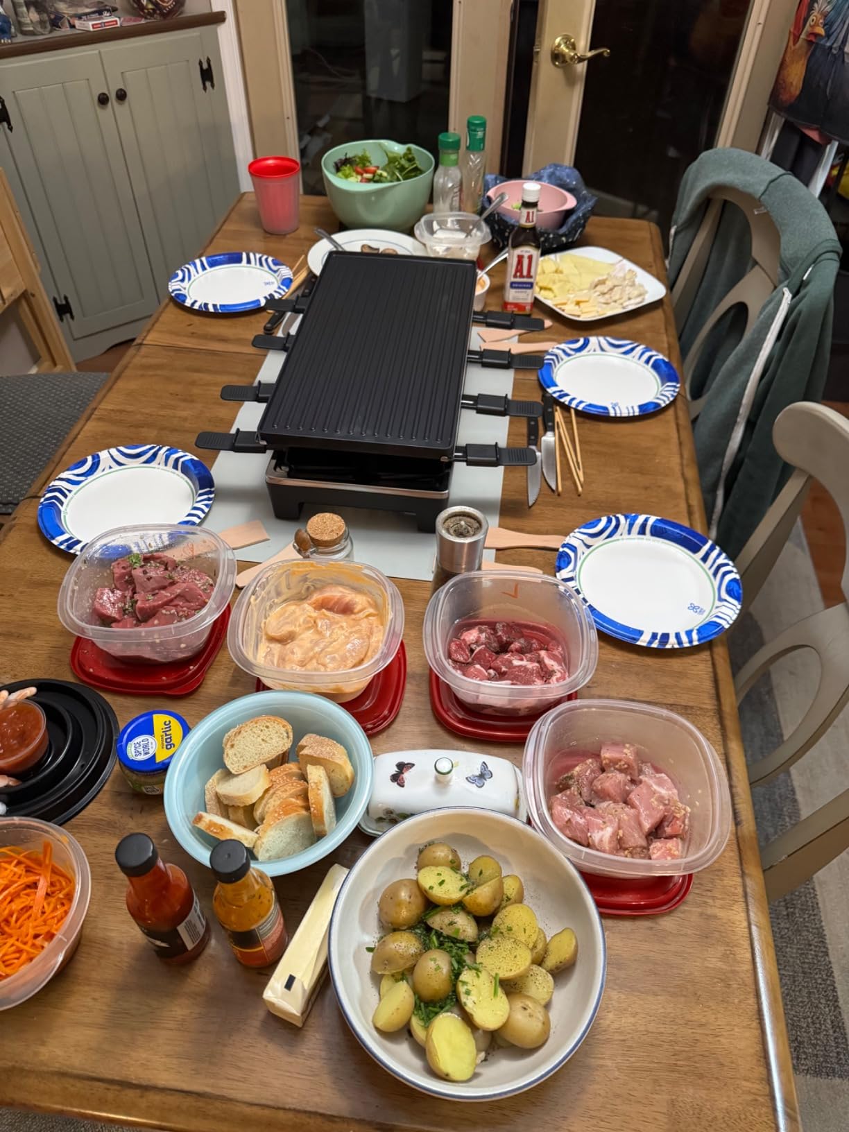 Raclette Grill, Techwood Electric Indoor Grill with 2 Reversible Non-stick Grill Griddle Plates, 1 Stone Grill Plate, 1500W Fast Heating with 8 Cheese Pans, Ideal for Parties and Family Fun, Black customer photo 1