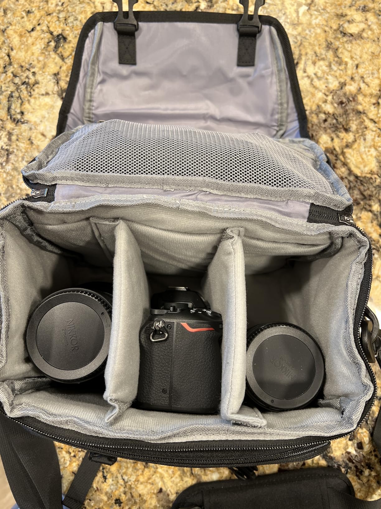 RAINSMORE Camera Bag, DSLR/SLR/Mirrorless Camera Sling Bag for Photographers Waterproof Small Camera Case with Tripod Holder & Rain Cover Camera Crossbody Bag for Canon/Nikon/Sony/Fuji, Black customer photo 1