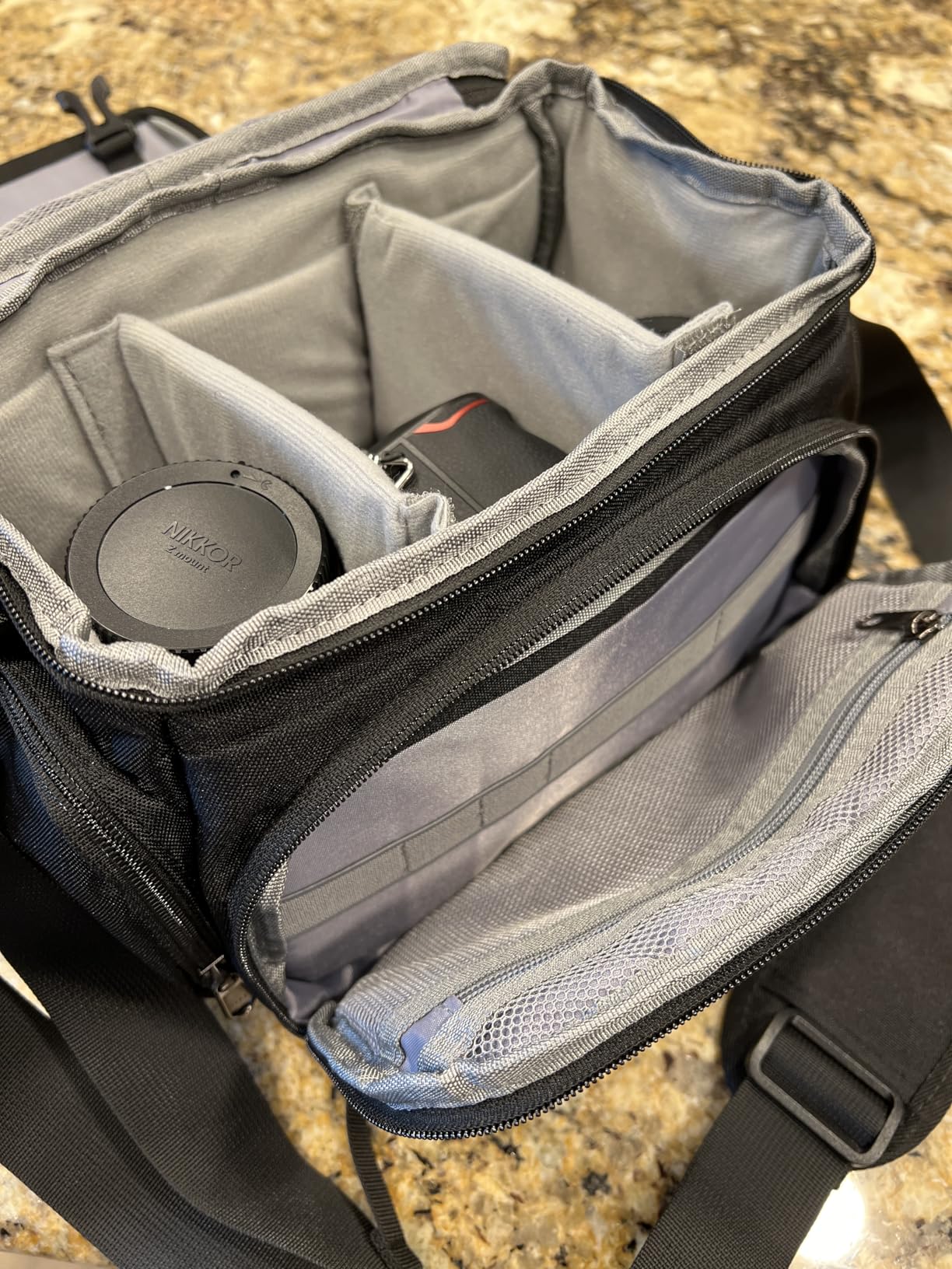 RAINSMORE Camera Bag, DSLR/SLR/Mirrorless Camera Sling Bag for Photographers Waterproof Small Camera Case with Tripod Holder & Rain Cover Camera Crossbody Bag for Canon/Nikon/Sony/Fuji, Black customer photo 2