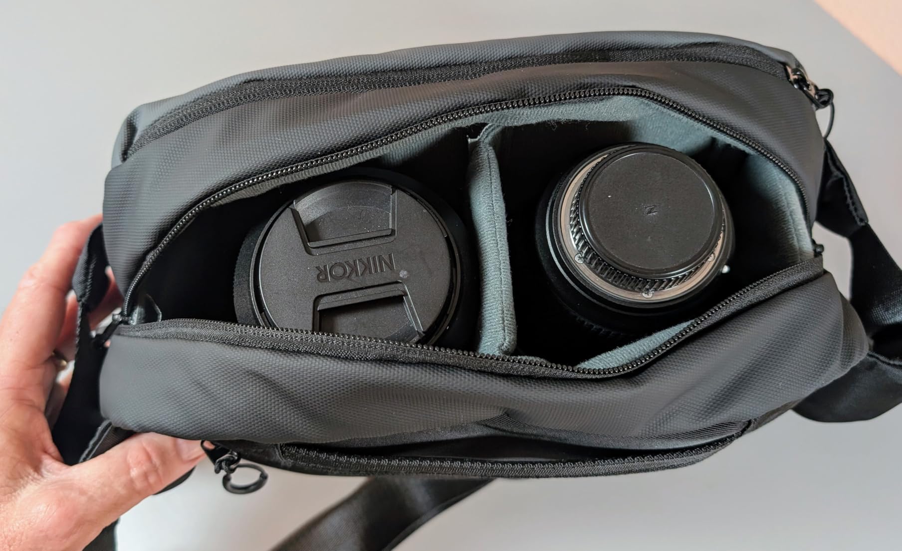 FINTIE Camera Sling Bag for DSLR/SLR/Mirrorless, Waterproof Crossbody Camera Case with Tripod Holder for Canon R50/R100/Sony A6400/Nikon Z6 III for Amateur Photographers, Black + Gray customer photo 1