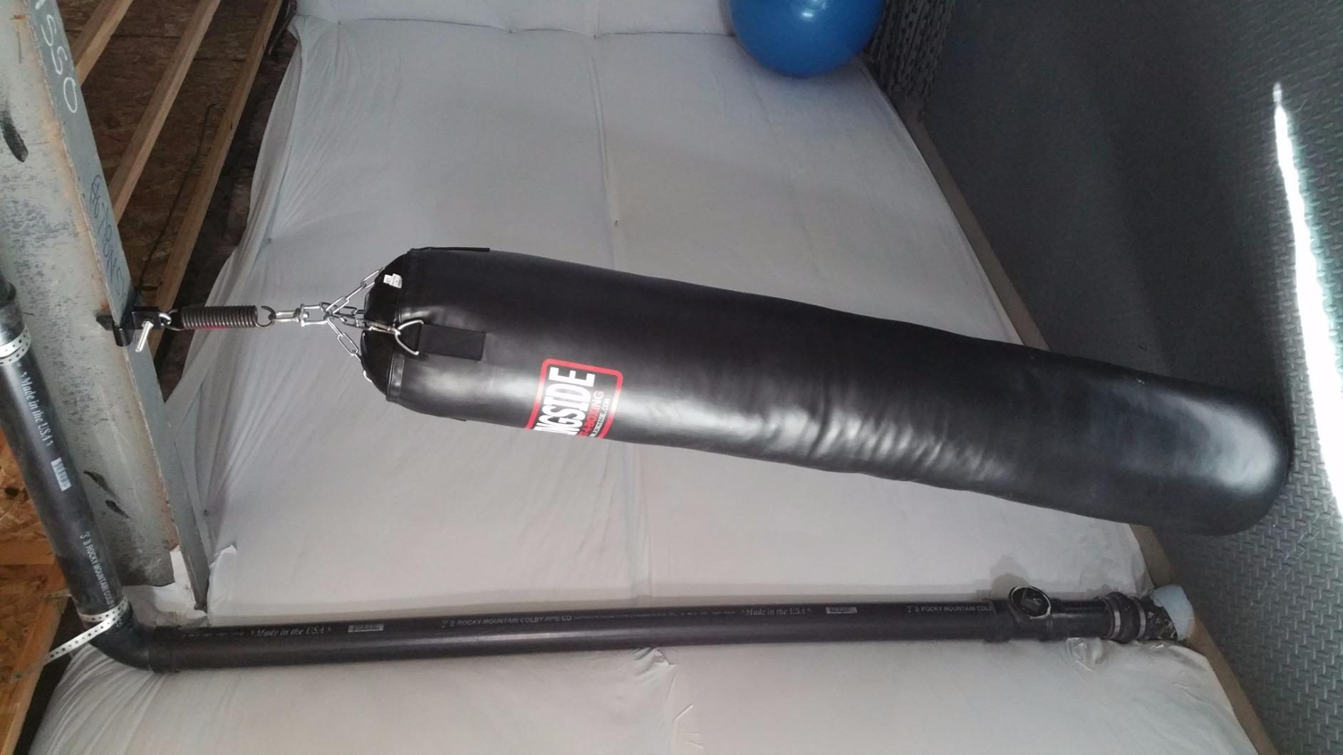 Ringside 100-Pound Muay Thai Heavy Bag, Sturdy Powerhide Punching Bag for Boxing, MMA, Muay Thai, and Kickboxing Training, Includes Chain and Swivel, Black, 72