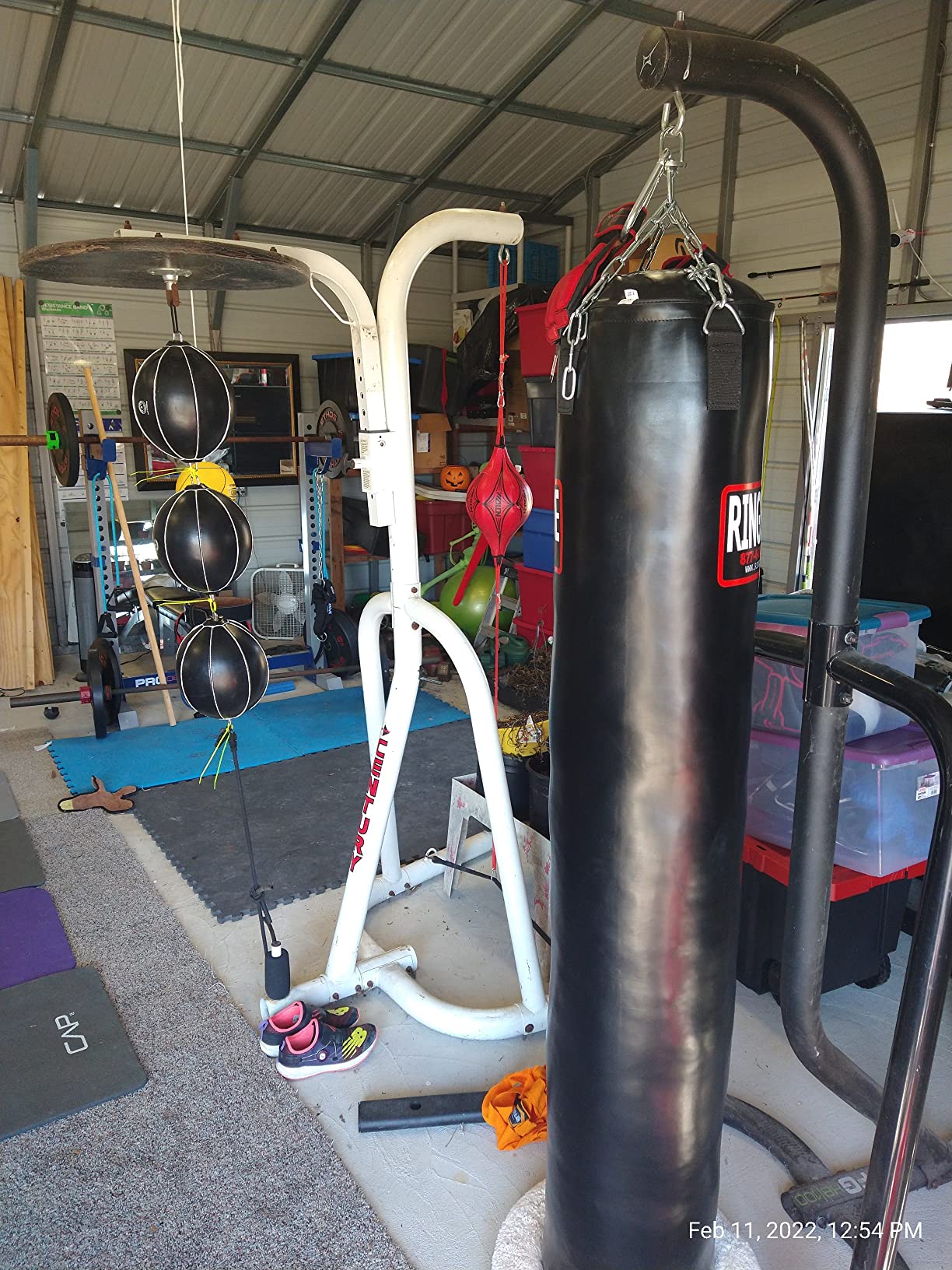 Ringside 100-Pound Muay Thai Heavy Bag, Sturdy Powerhide Punching Bag for Boxing, MMA, Muay Thai, and Kickboxing Training, Includes Chain and Swivel, Black, 72