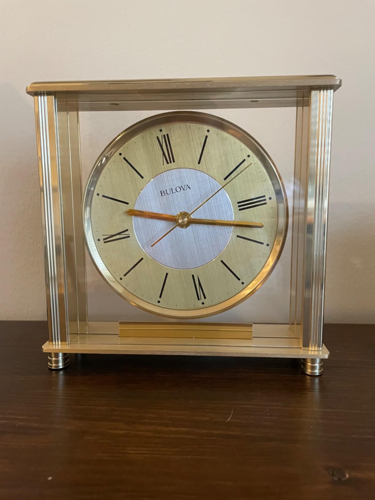 Bulova B1700 Grand Prix Table Clock | Brass Metal Finish | Glass Enclosure with Two-Tone Metal Dial | Quiet Sweep | Elegant Desktop Timepiece for Offices & Collectors customer photo 1