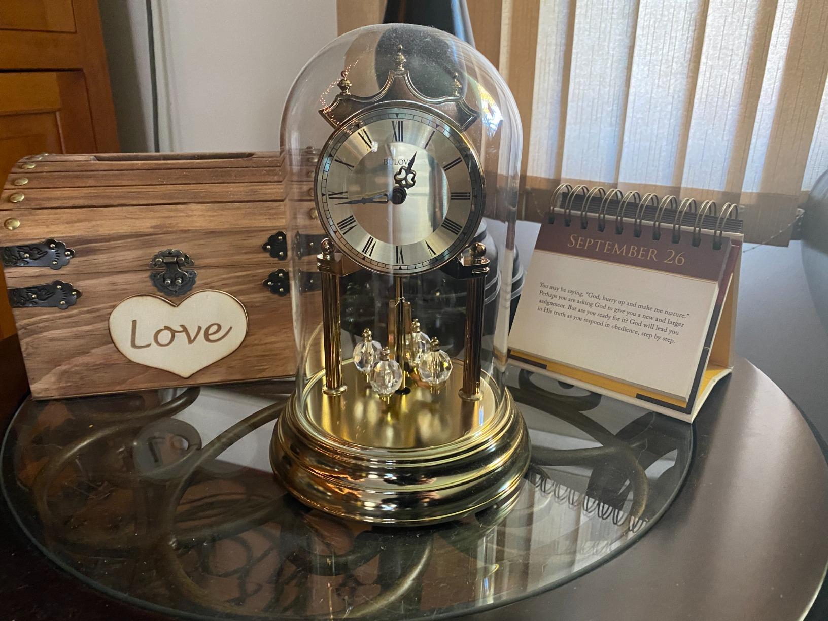 Bulova Tristan I Desk and Table Clock | Model B8818 | Polished Brass Finish | Polished Metal Base | Floating Dial | Roman Numerals | Elegant Pendulum Design customer photo 1