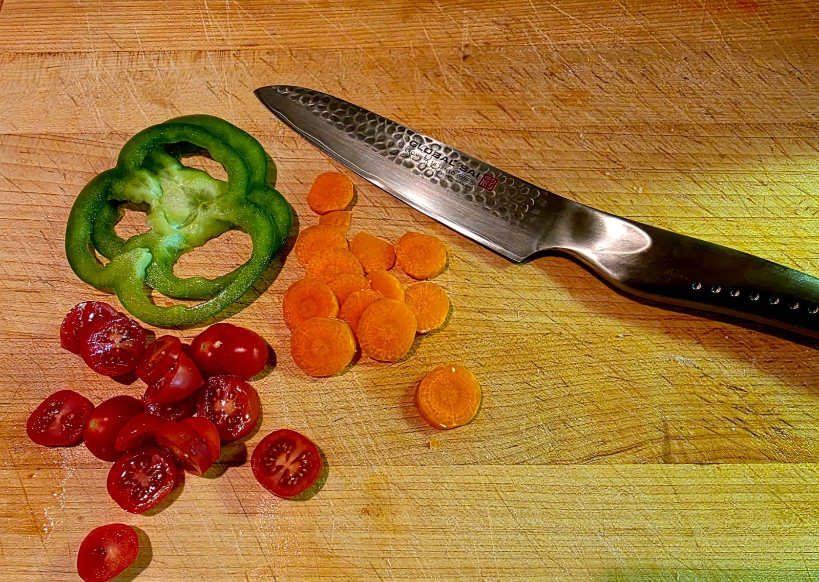 Global SAI 5 1/2 Inch Chef Knife - Lightweight Japanese Stainless Steel, Razor Sharp Edge, Hand Hammered Blade, Thumb Rest, Made in Japan, SAI-M01 customer photo 1