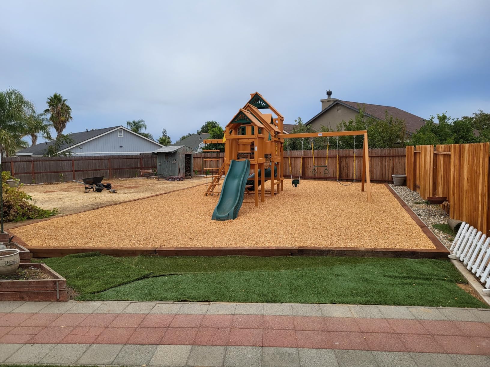 Gorilla Playsets 01-1037-AP Treasure Trove Treehouse Wood Swing Set with Tube Slide, Built-in Sandbox Area, and Clatter Bridge, Amber customer photo 2