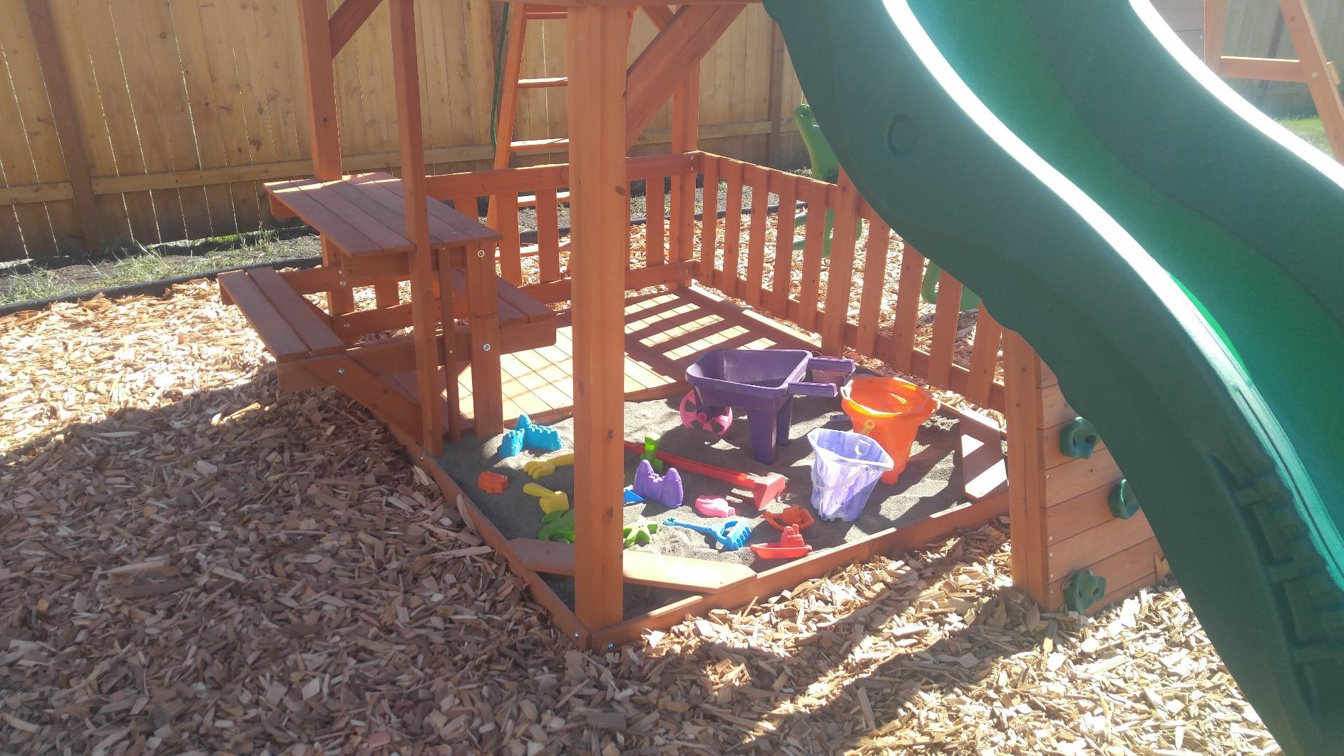 Backyard Discovery Skyfort II Cedar Wood Swing Set with Wave Slide, Raised Clubhouse, Crow's Nest, Monkey Bars, Balcony, Belt Swings, Trapeze, Rock Wall, Picnic Table, Sandbox, Ladder, Outdoor Playset customer photo 1