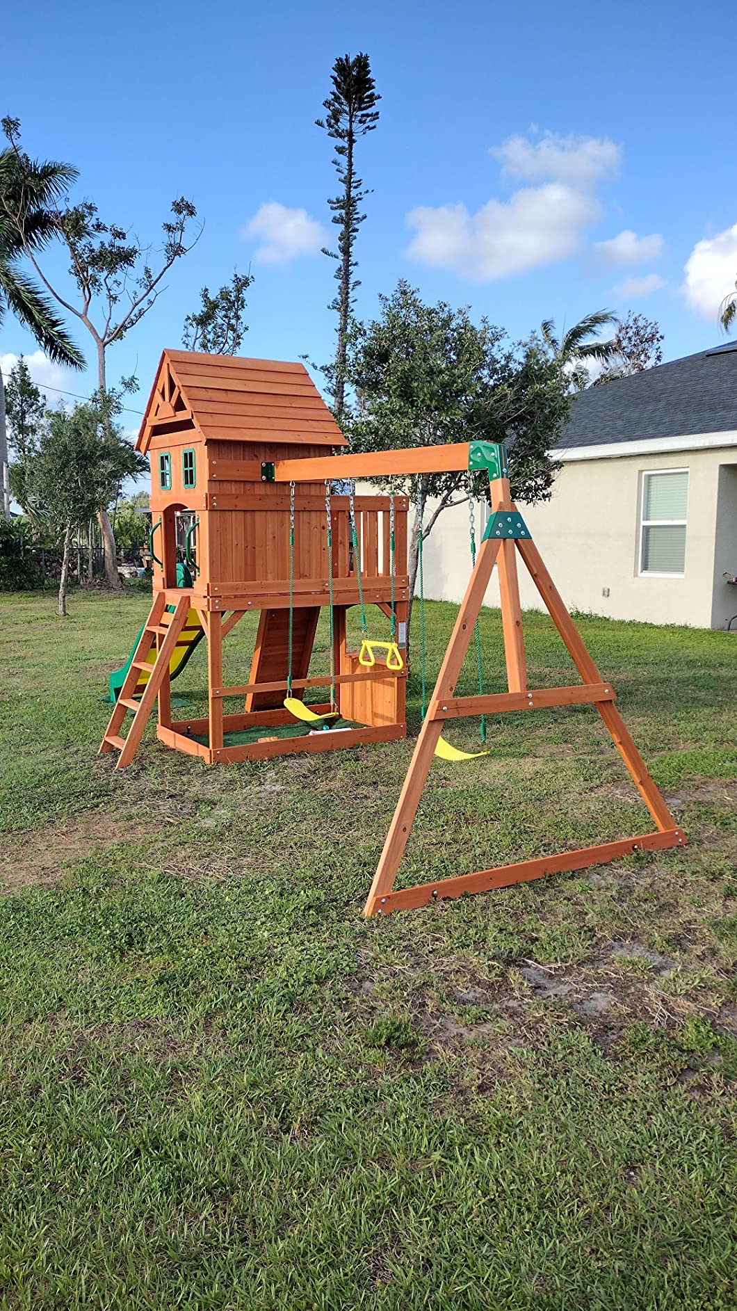 Backyard Discovery Atlantis Cedar Wood Swing Set with Wave Slide, Raised Clubhouse, Rock Wall, Belt Swings, Trapeze, Balcony, Lower Play Space, Snack Bar, Sandbox Area, Step Ladder, Outdoor Playset customer photo 1