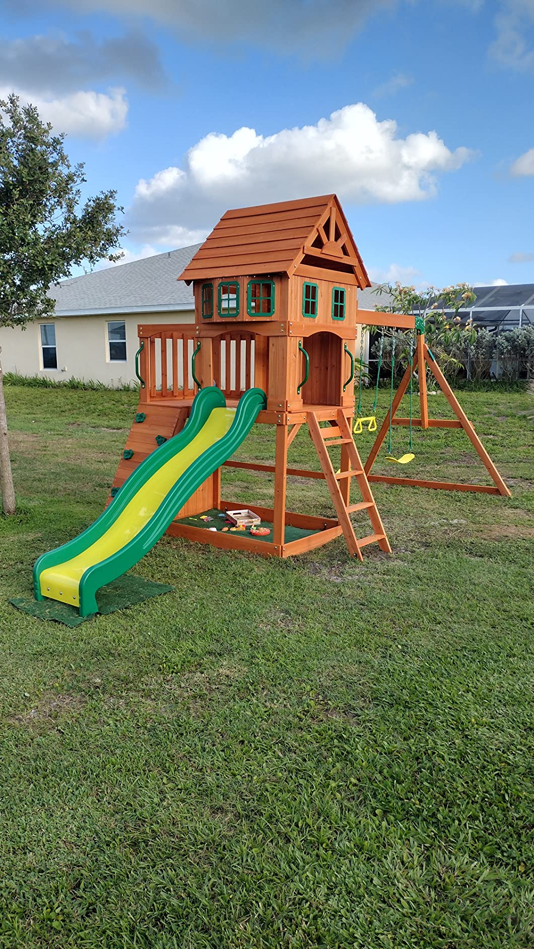 Backyard Discovery Atlantis Cedar Wood Swing Set with Wave Slide, Raised Clubhouse, Rock Wall, Belt Swings, Trapeze, Balcony, Lower Play Space, Snack Bar, Sandbox Area, Step Ladder, Outdoor Playset customer photo 2