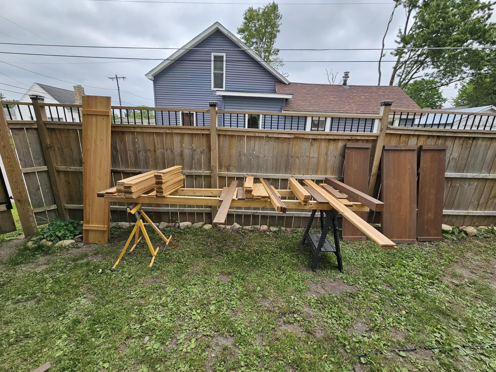 Backyard Discovery Skyfort All Cedar Swing Set, Elevated Covered Wood Roof Clubhouse with Bay Windows, 2 Belt Swings, Web Swing, 10ft Wave Slide, 5 ft Tube Slide, Covered Picnic Table, 5 ft Rock Wall customer photo 1
