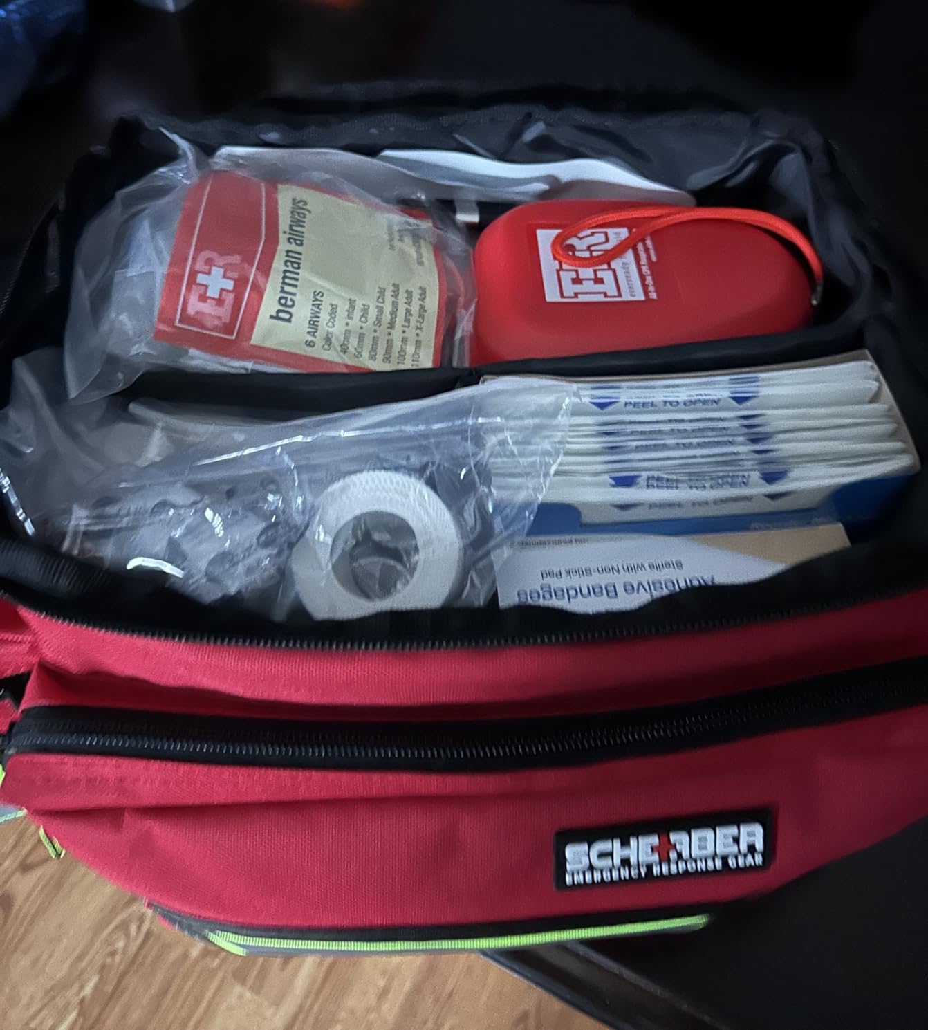 Scherber First Responder Fully-Stocked Professional Essentials EMT/EMS Trauma Kit | HSA/FSA Approved | Reflective Bag w/8 Zippered Pockets & Compartments & 200+ First Aid Supplies - Red customer photo 1