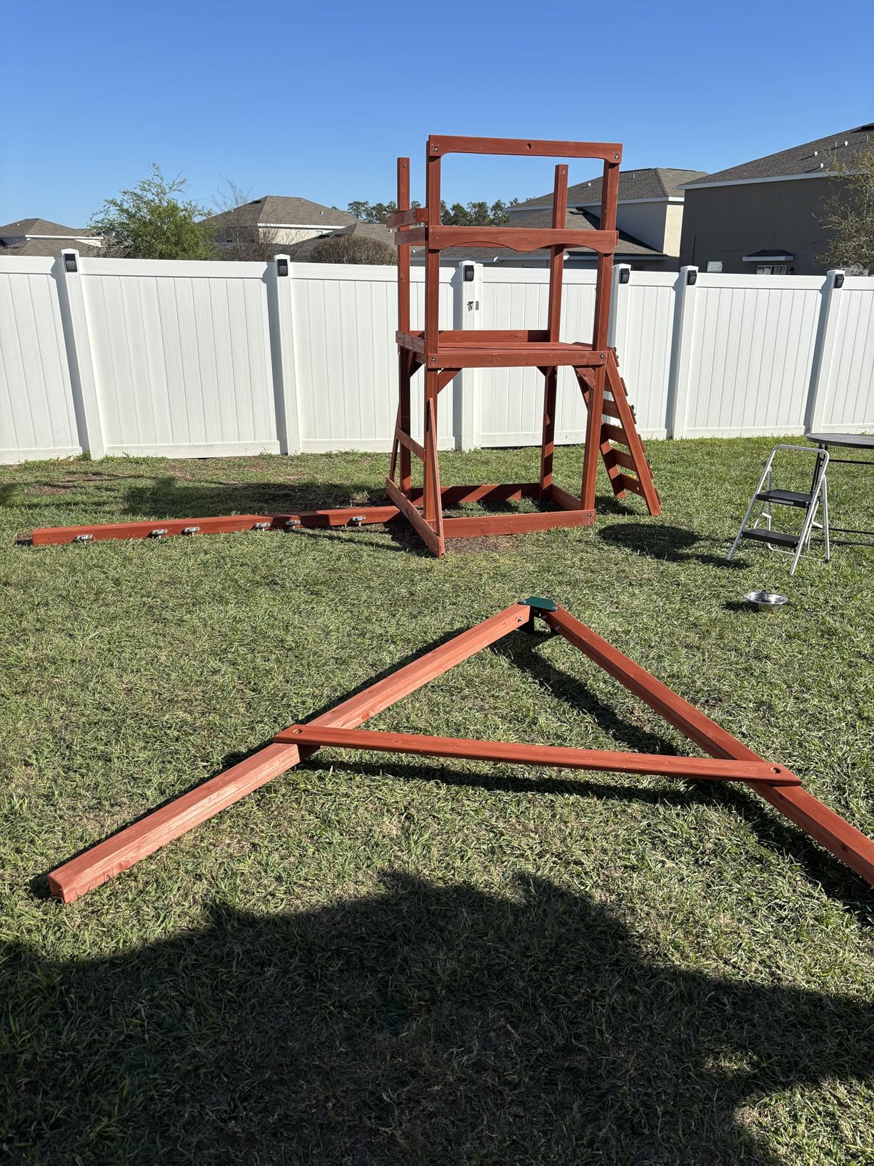 Gorilla Playsets 01-1057 Playmaker Deluxe Wooden Swing Set with Vinyl Canopy Roof, Dual Wave Slides, and Rock Climbing Wall, Redwood Stained Cedar customer photo 2