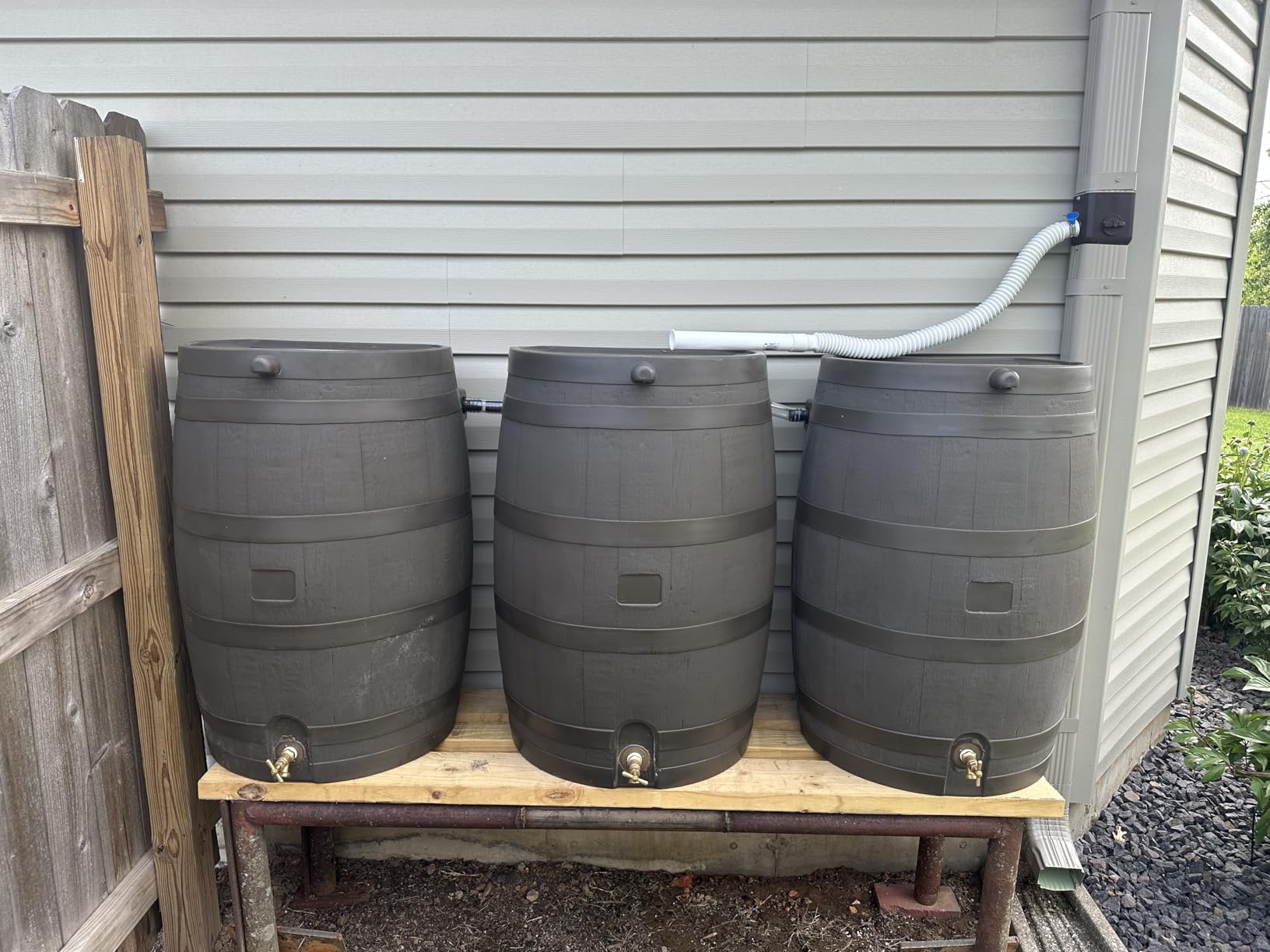 RTS Home Accents 50-Gallon Rain Barrel, Flat Back Rain Water Collection Barrel, Stand Included, Walnut Color customer photo 1