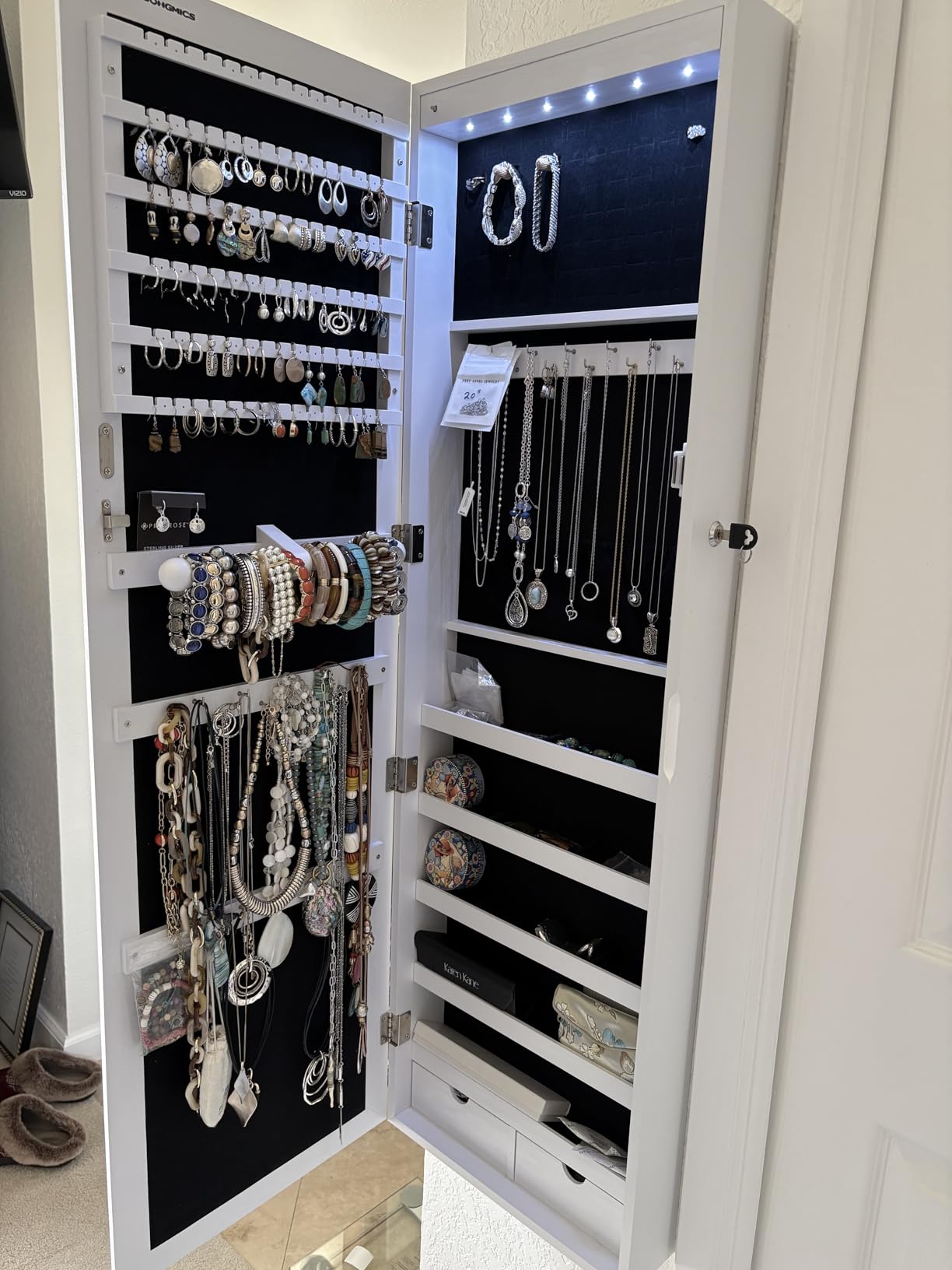 SONGMICS 6 LEDs Mirror Jewelry Cabinet, 47.2-Inch Tall Lockable Wall or Door Mounted Jewelry Armoire Organizer with Mirror, 2 Drawers, 3.9 x 14.6 x 47.2 Inches, Black UJJC093B01 customer photo 2